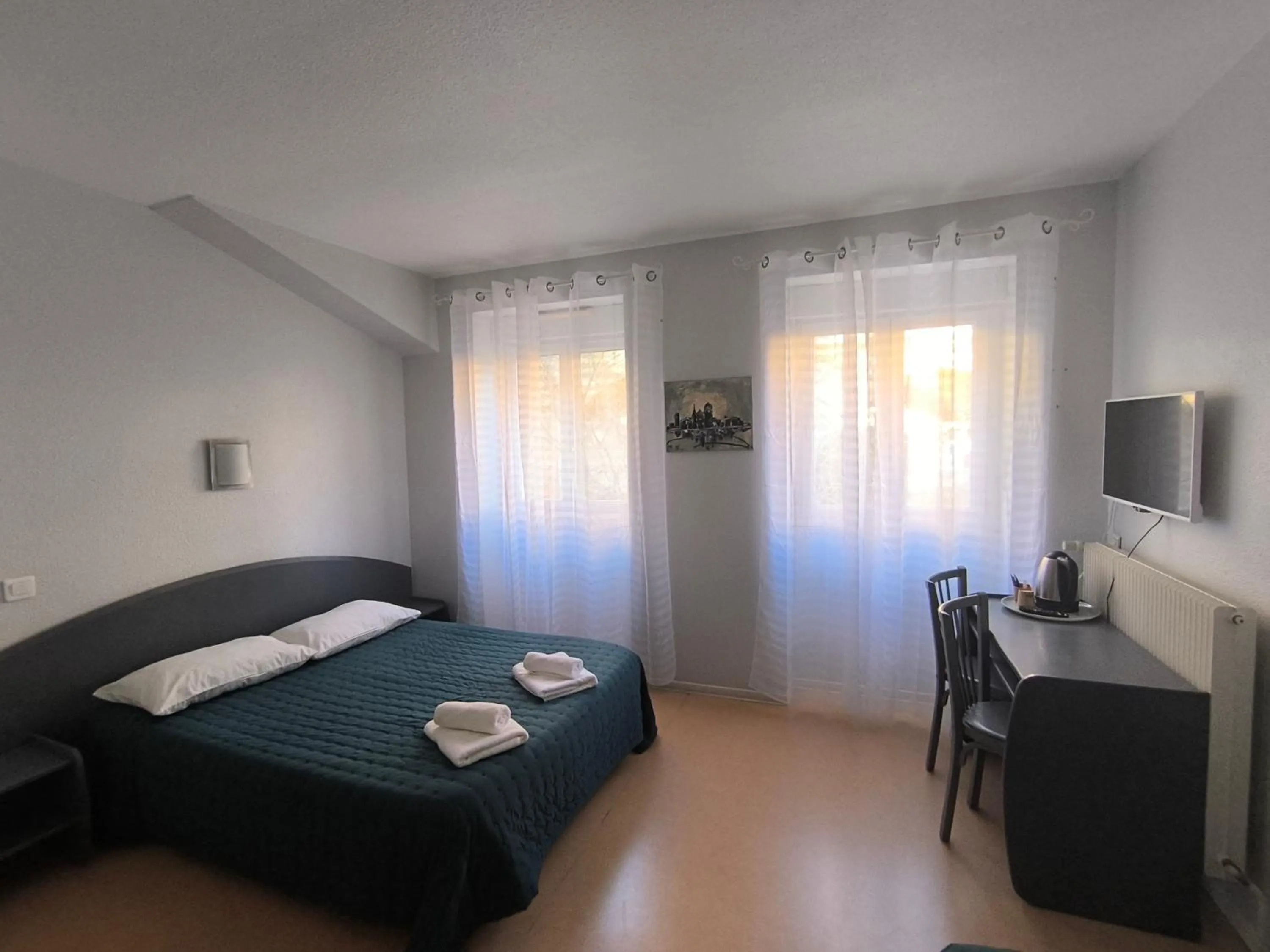 Bed in Central Hôtel