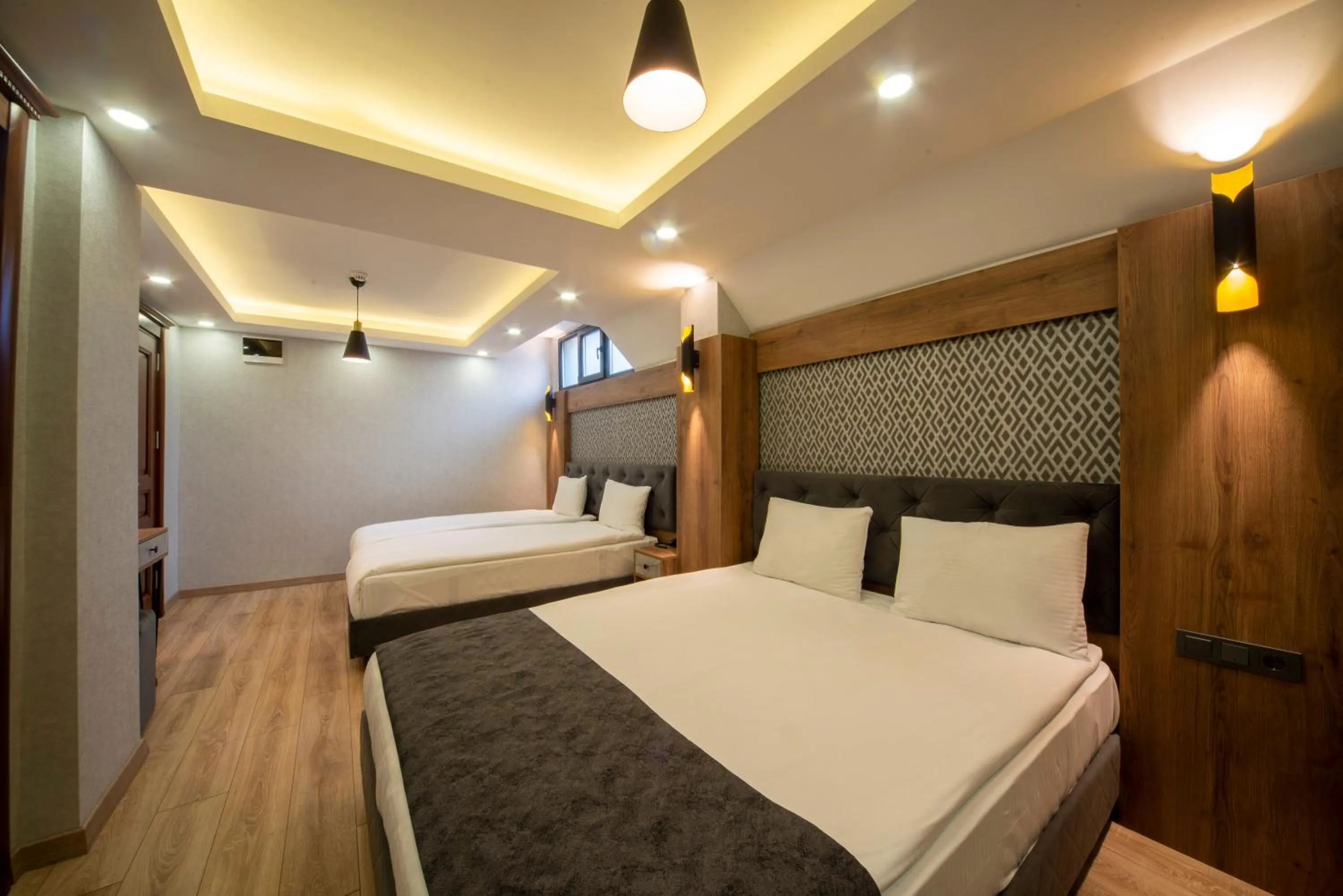 Bed in World Heritage Center Hotel