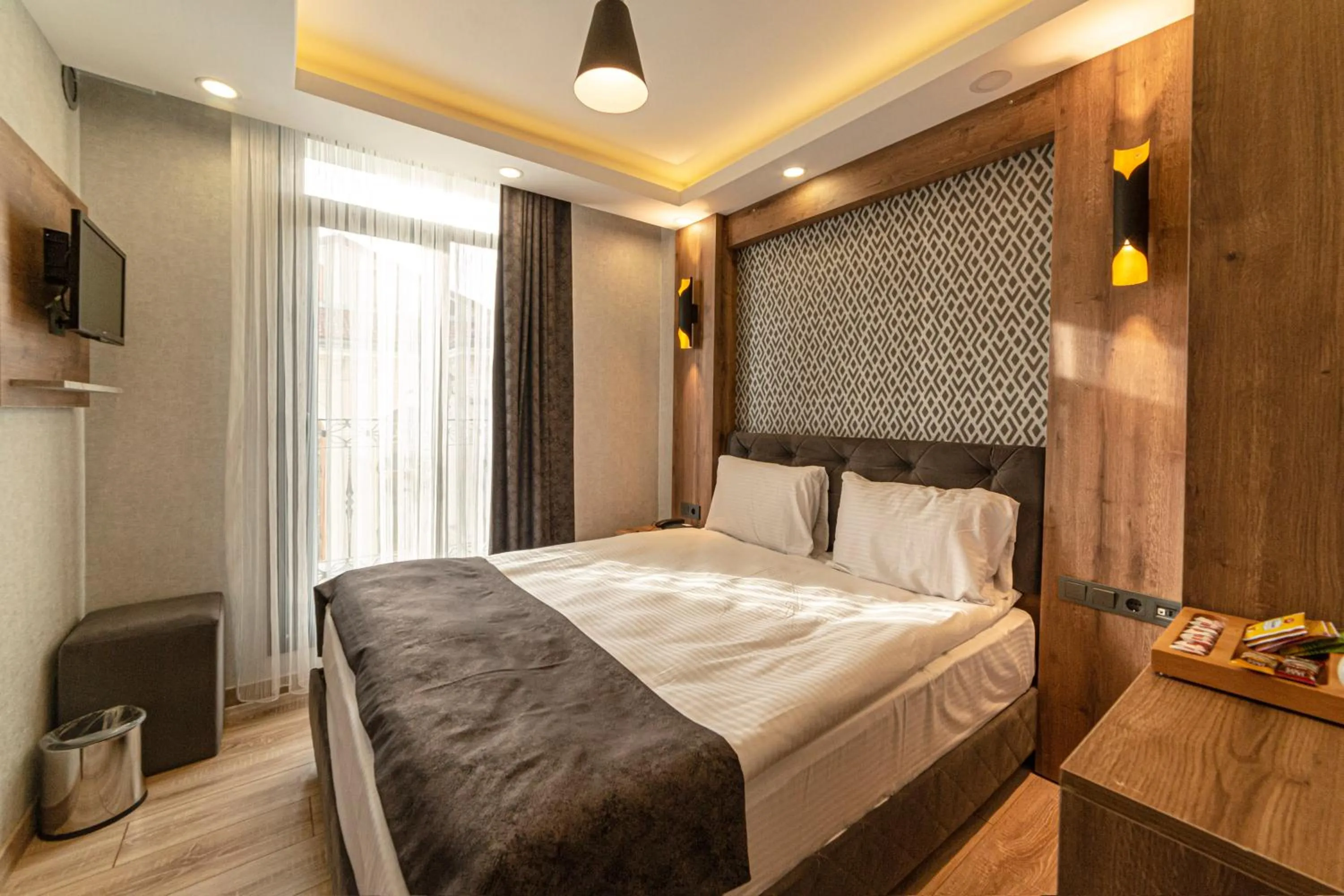 Bed in World Heritage Center Hotel