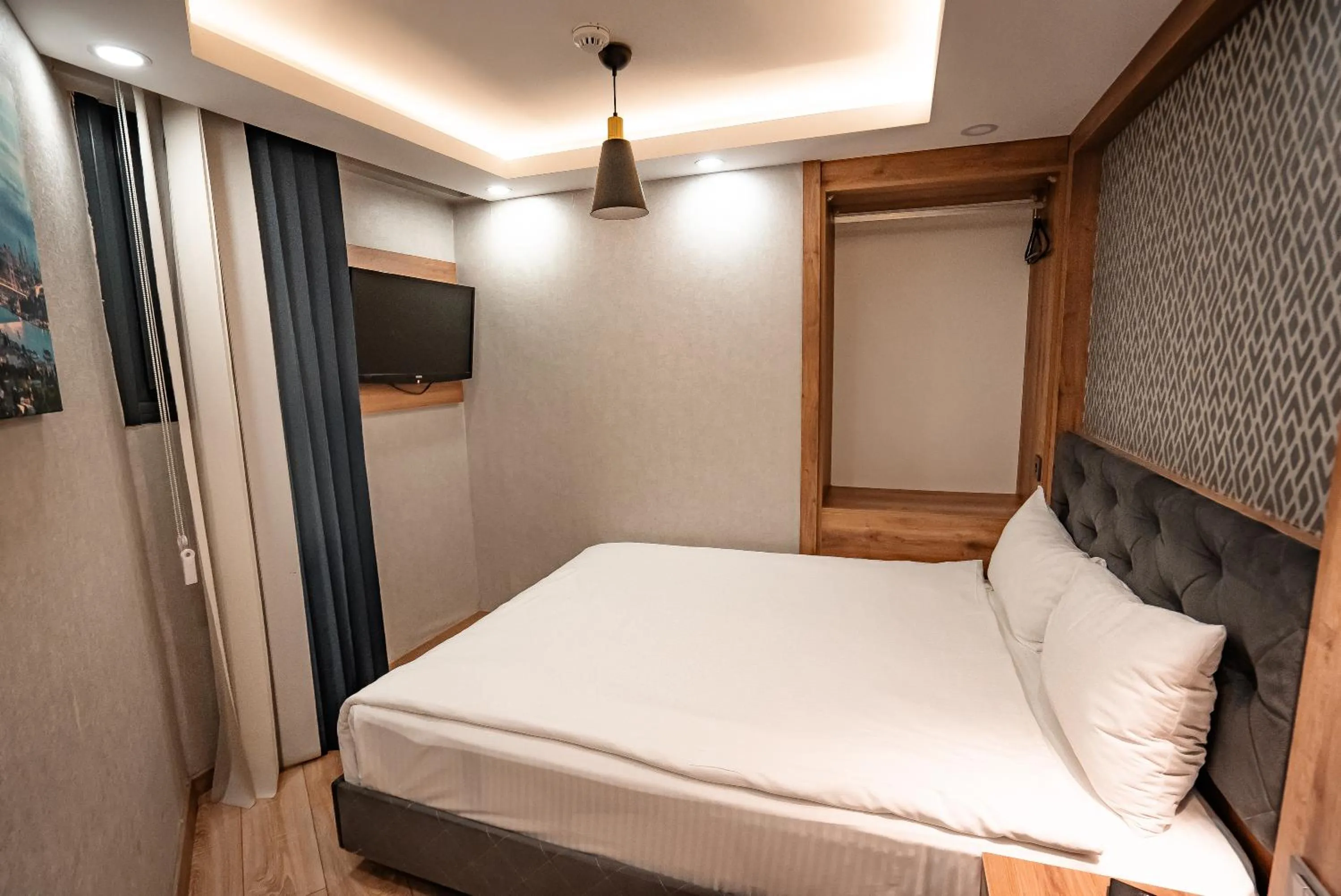 Bedroom, Bed in World Heritage Center Hotel