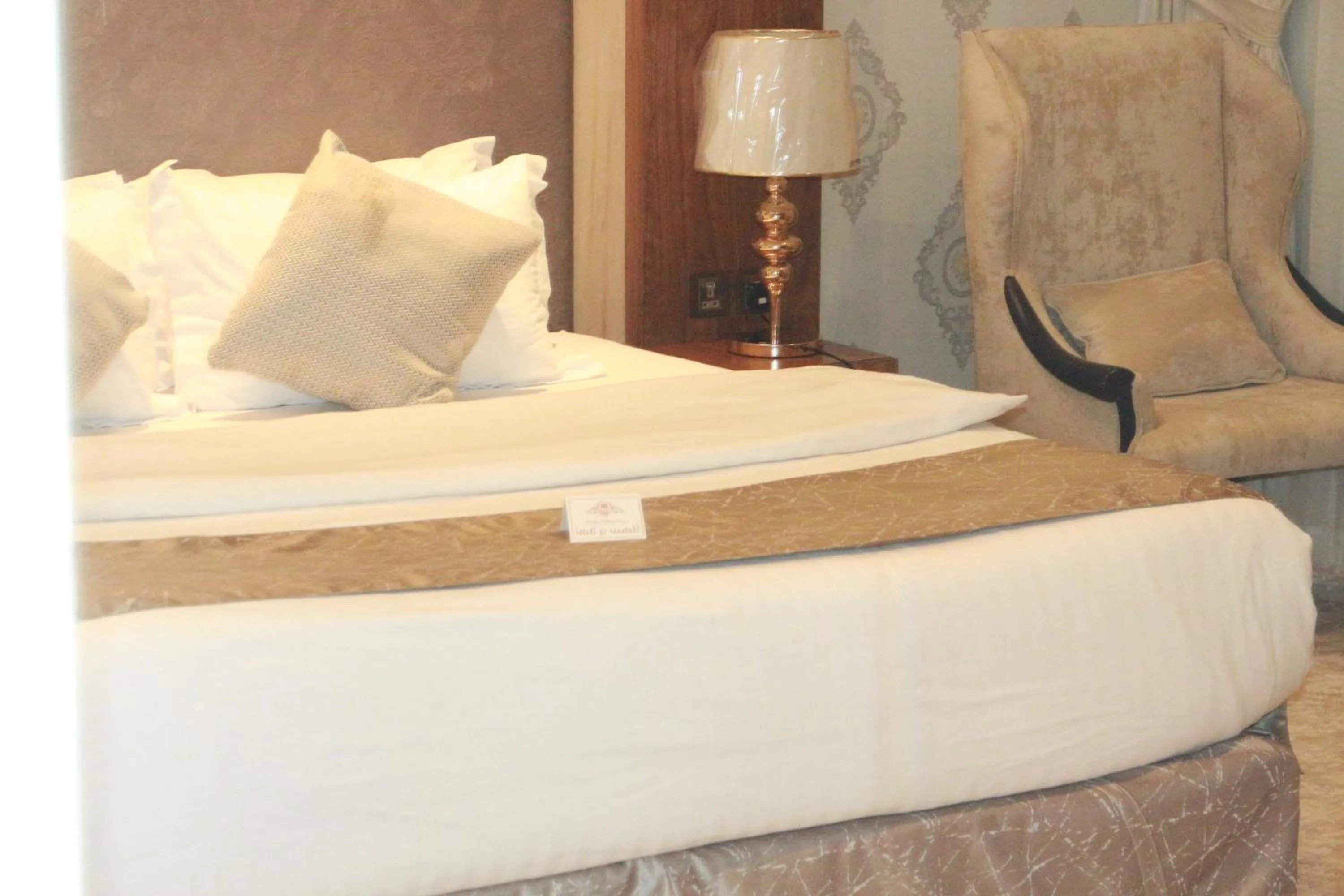 Bed in Crown City Hotel -فندق كراون ستي
