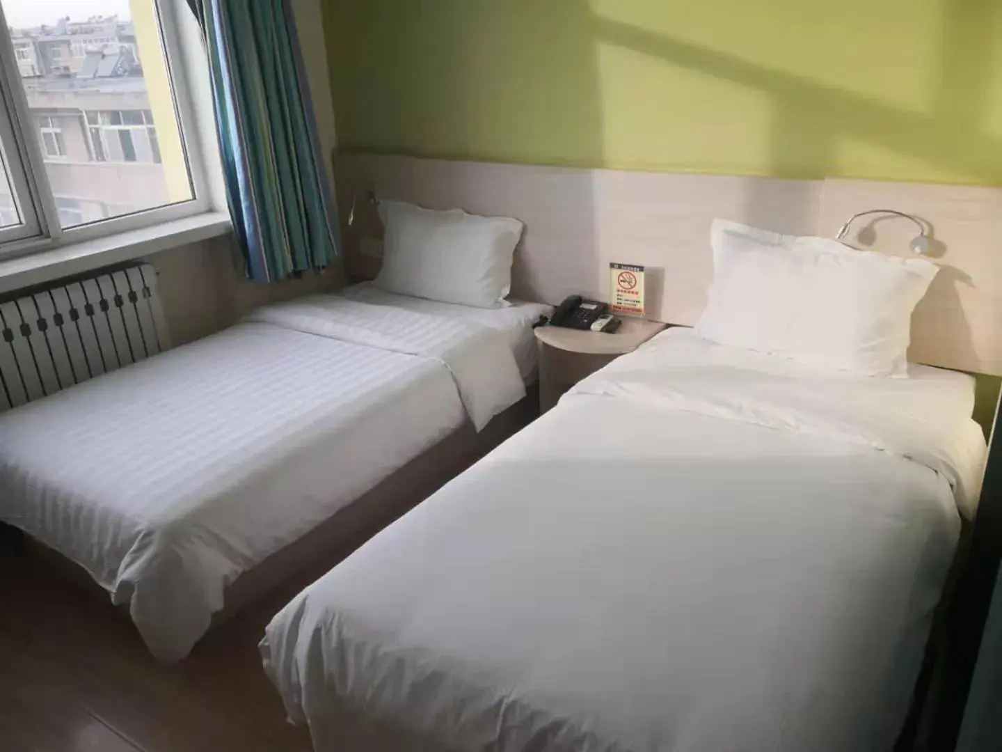 Bed in 7Days Inn Zhangjiakou Xuanhua Caishenmiao Street Bed in 7Days Inn Zhangjiakou Xuanhua Caishenmiao Street