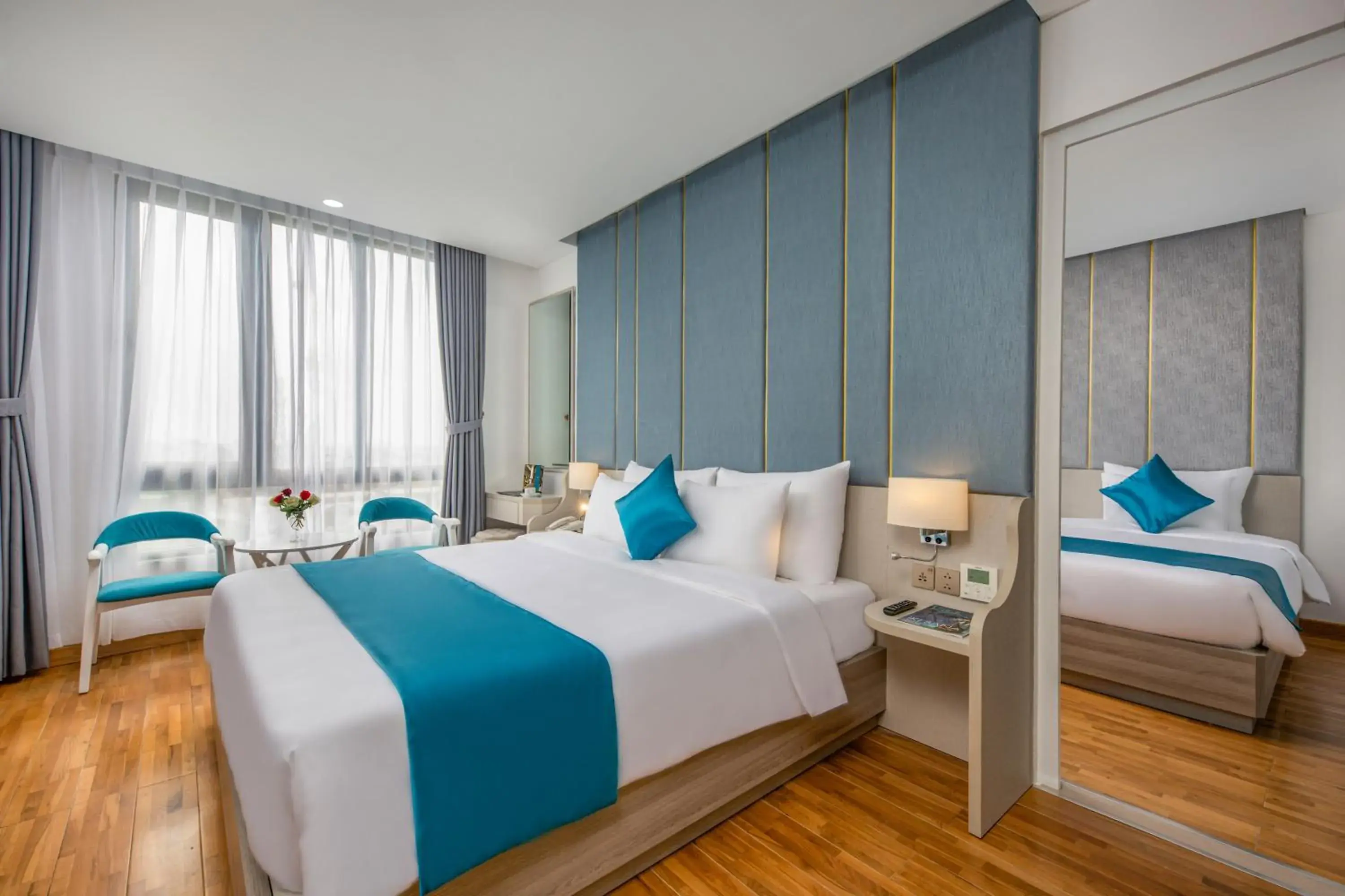 Photo of the whole room, Bed in Calix Hotel Da Nang Beach Photo of the whole room, Bed in Calix Hotel Da Nang Beach