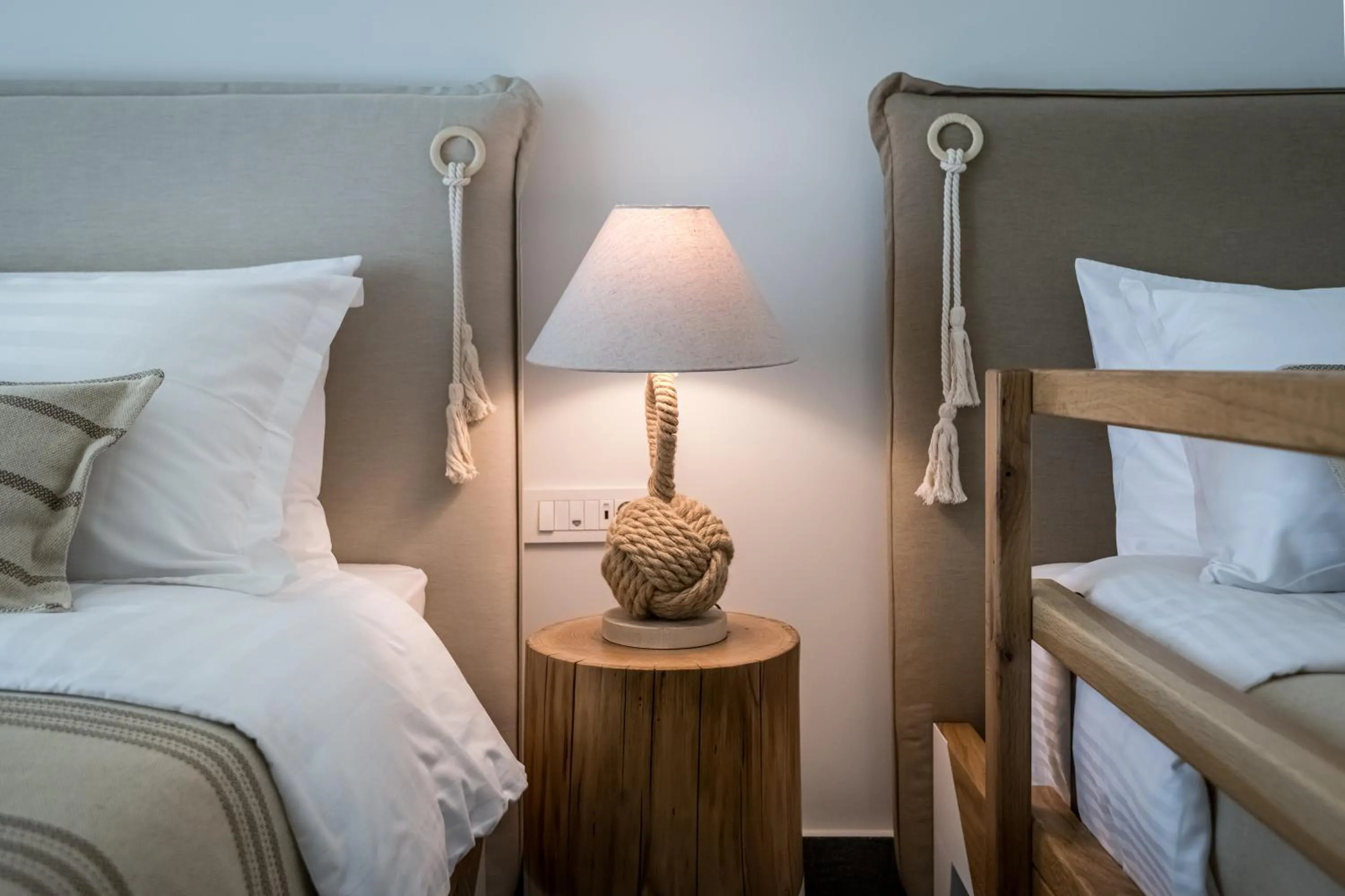 Bed in NISSEA Boutique Hotel