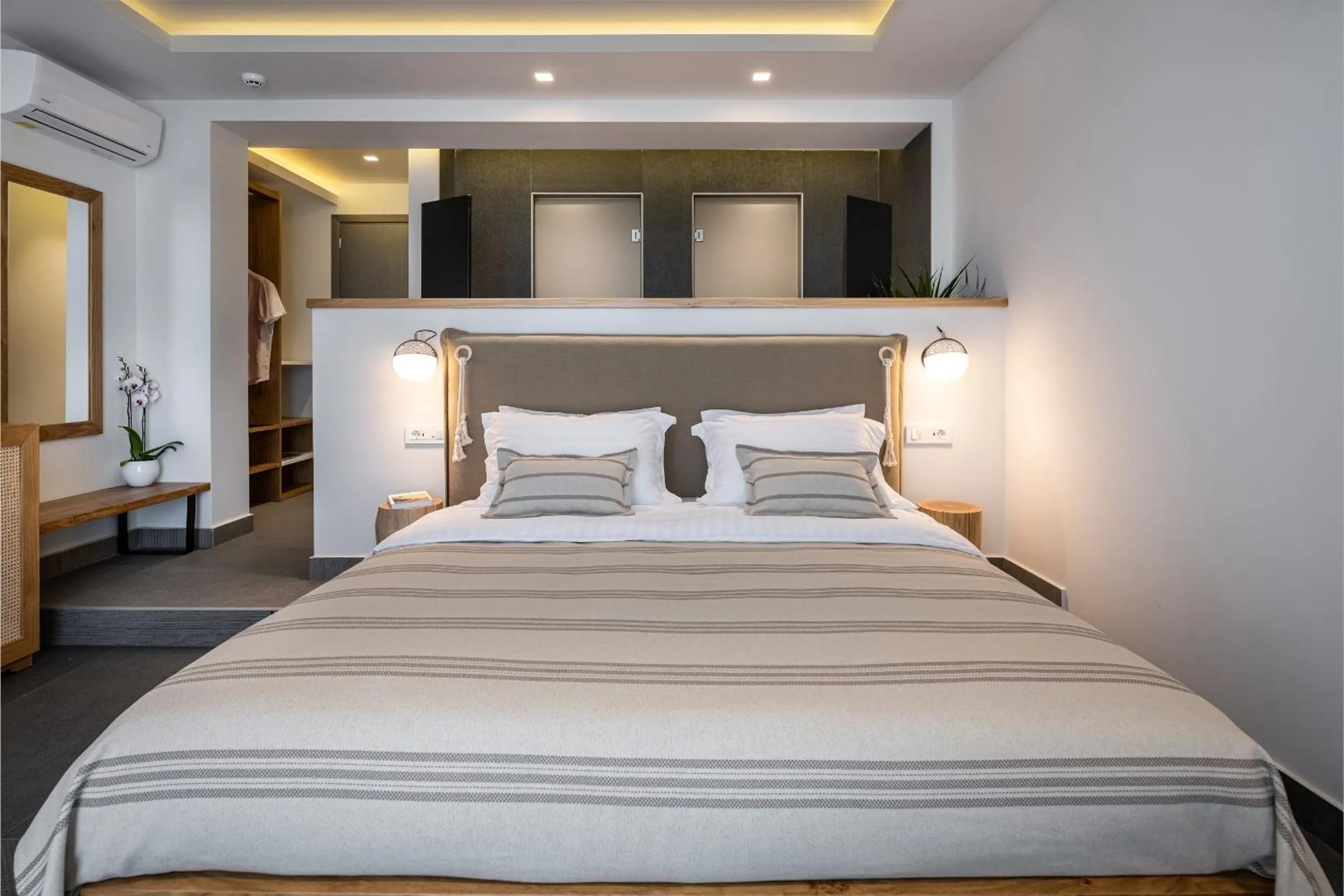 Bed in NISSEA Boutique Hotel