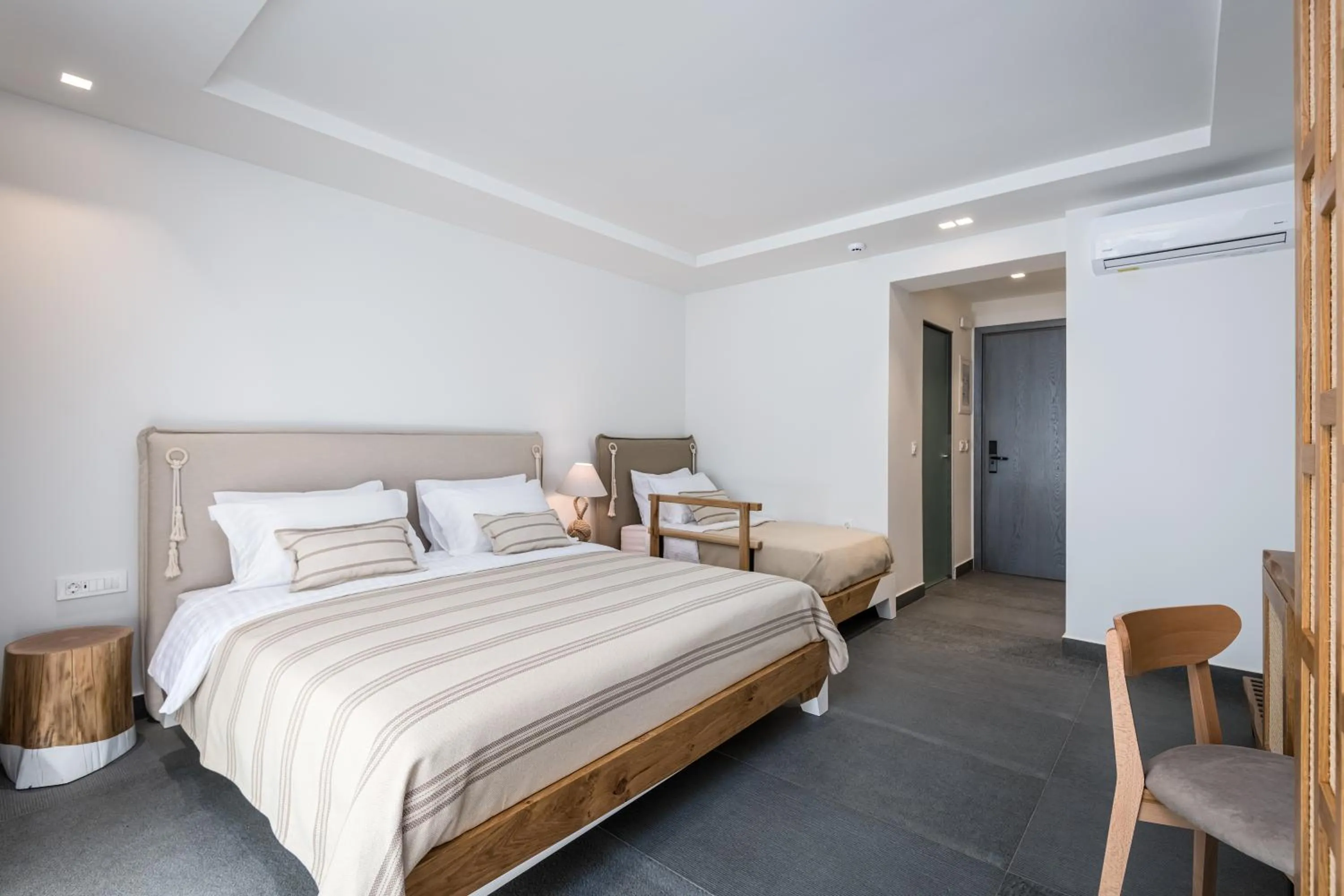 Bed in NISSEA Boutique Hotel