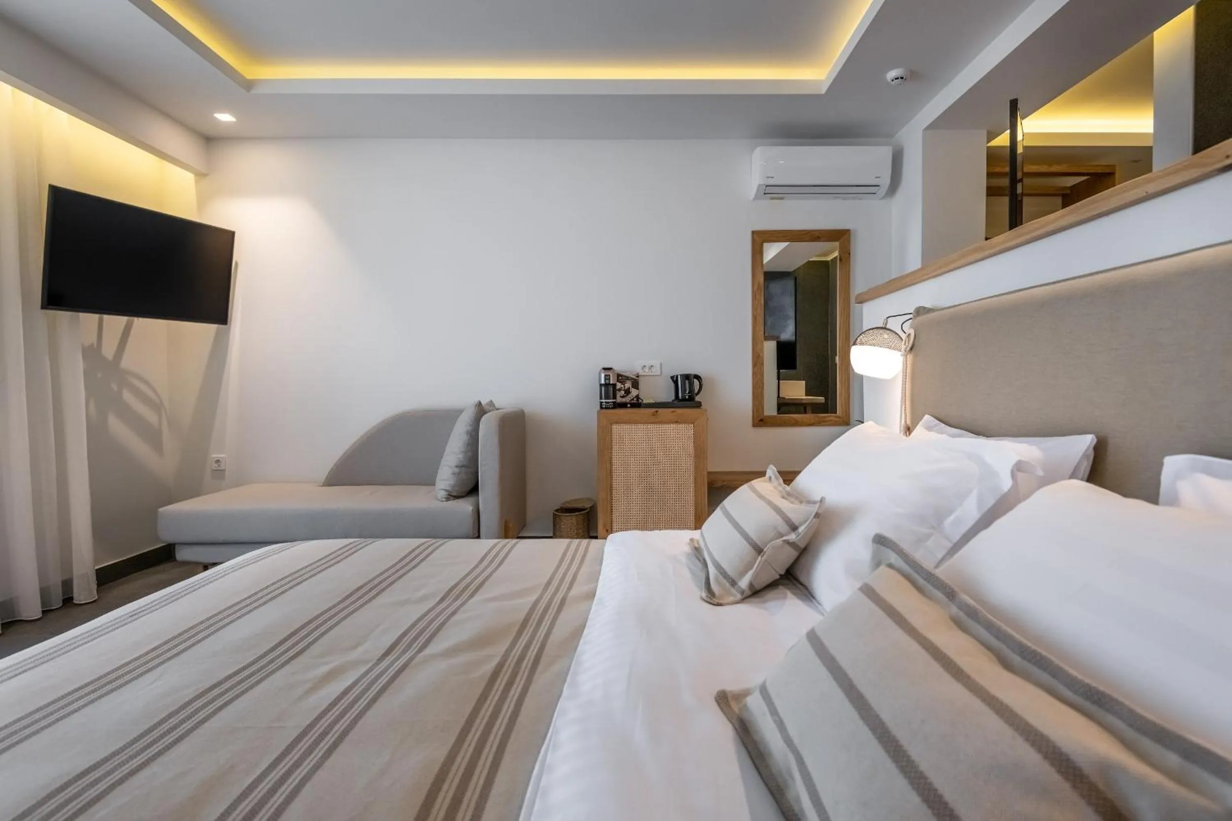 Bed in NISSEA Boutique Hotel