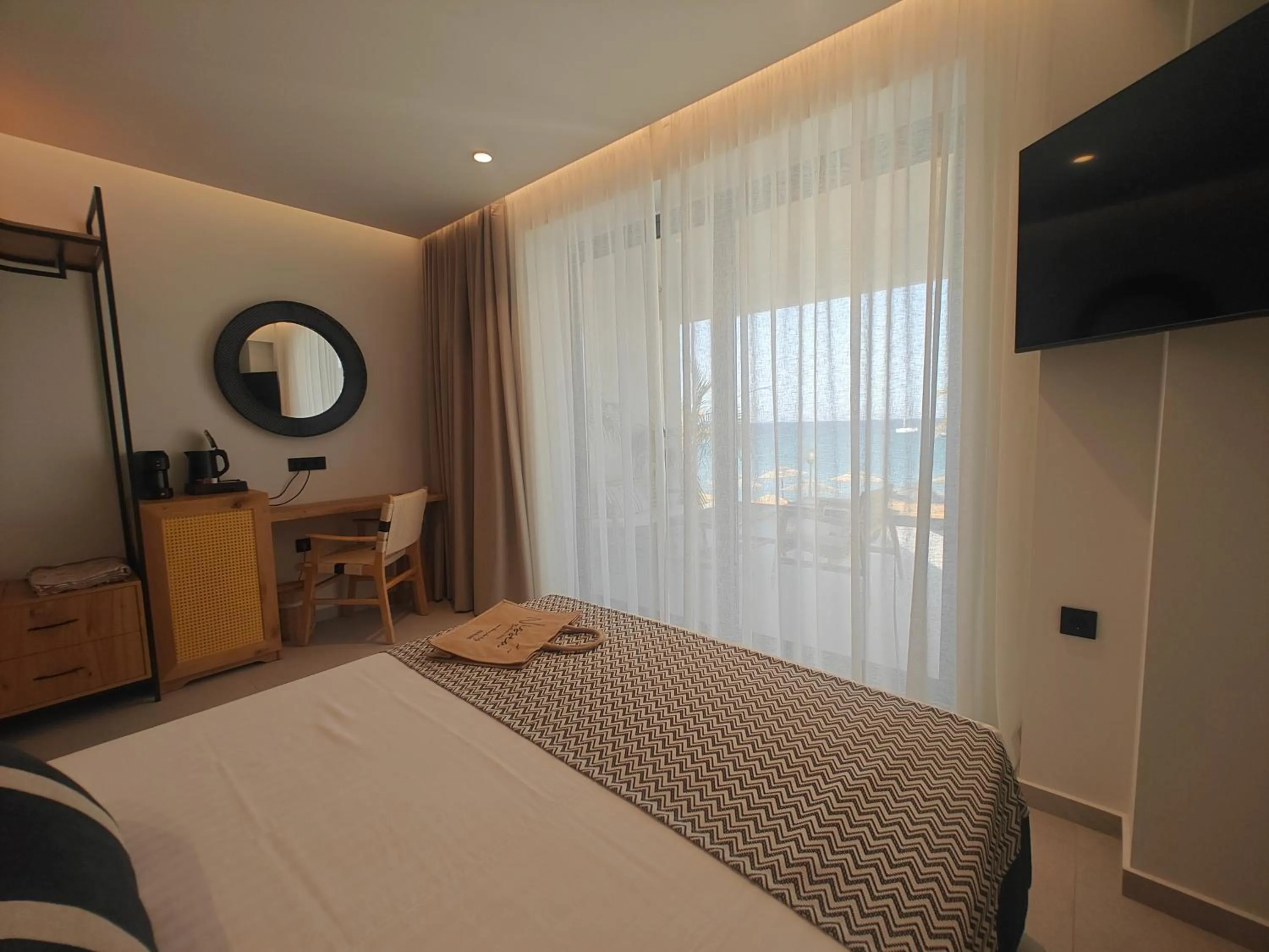 Bed in NISSEA Boutique Hotel