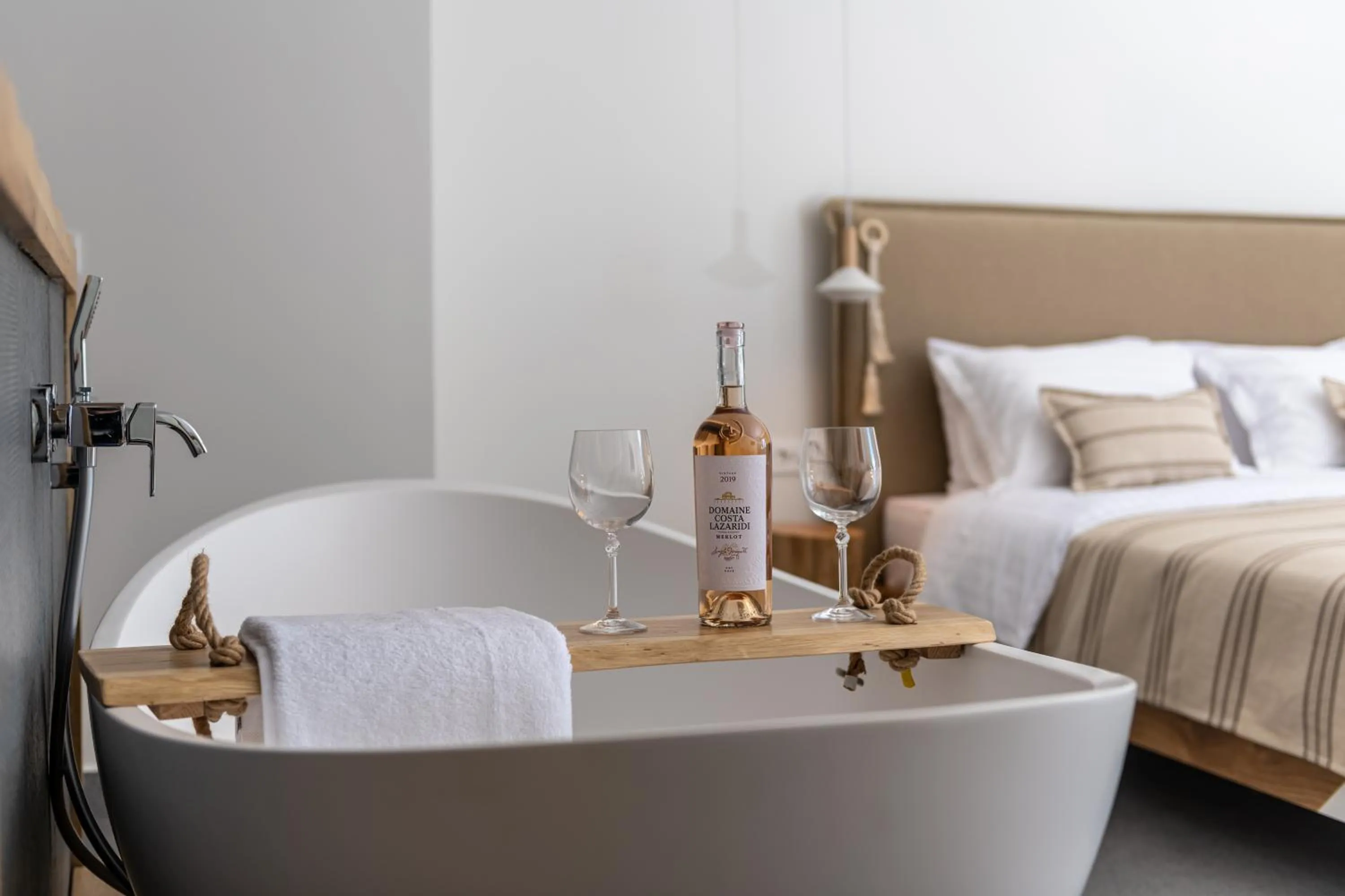 Bed in NISSEA Boutique Hotel