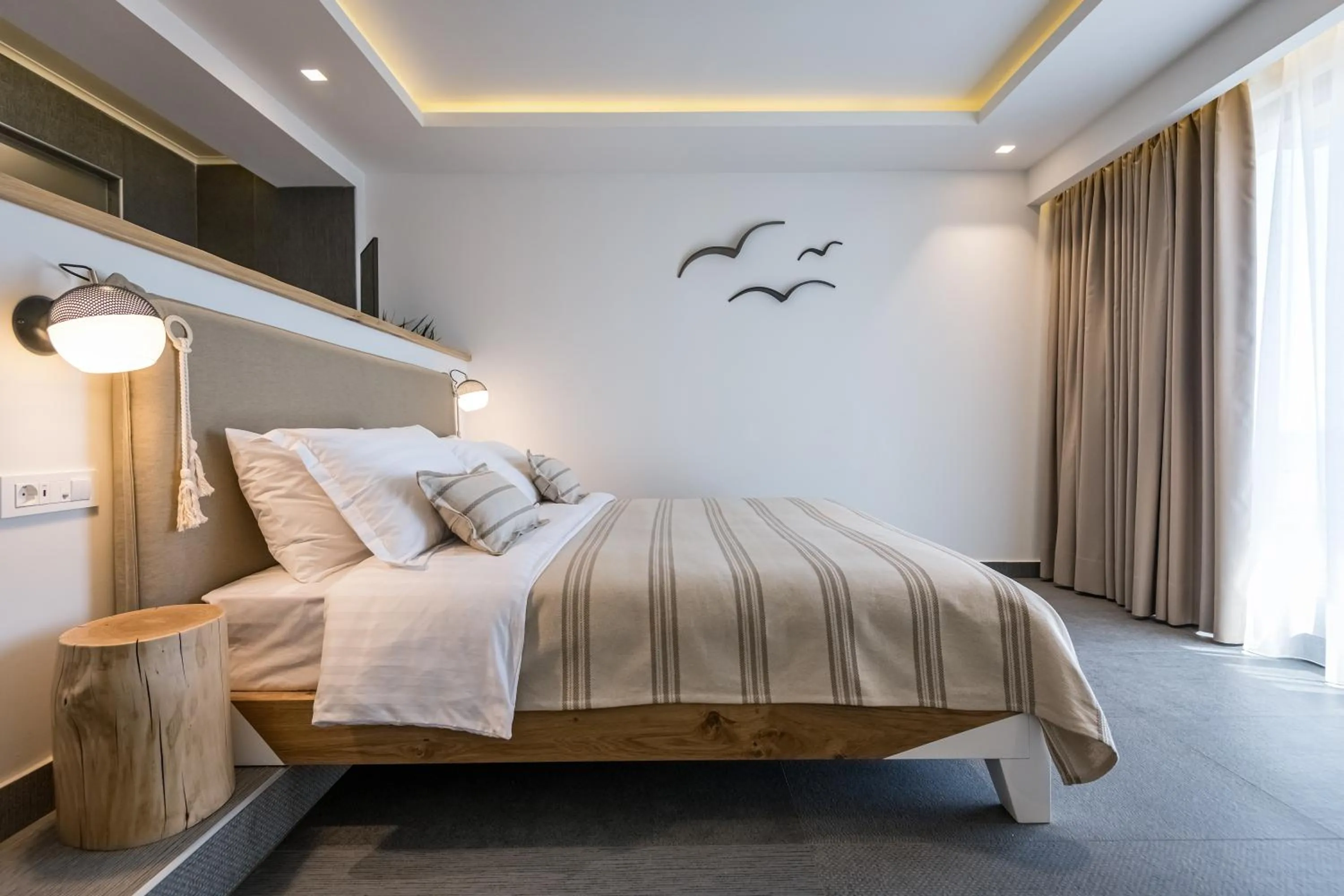 Bed in NISSEA Boutique Hotel