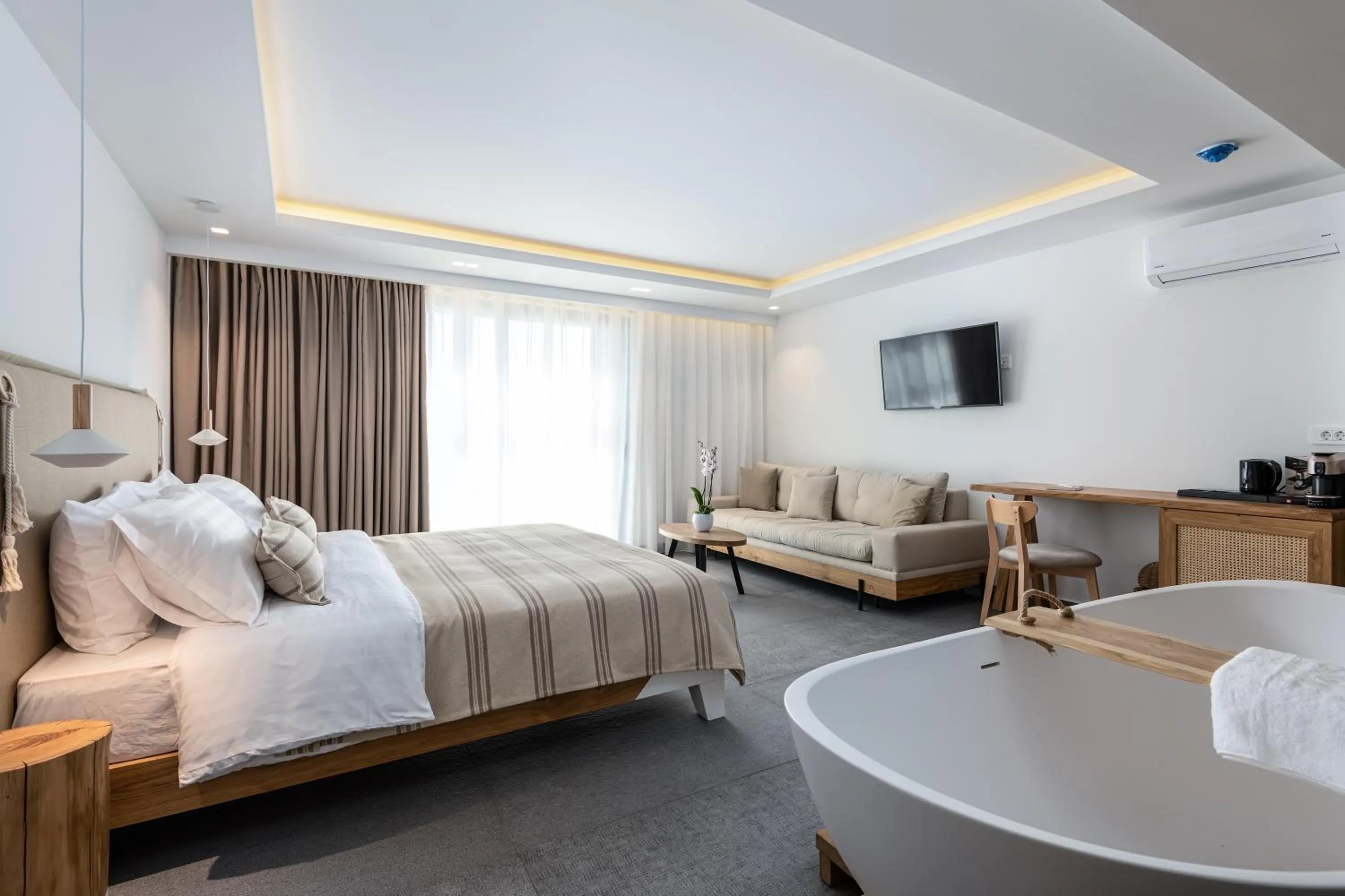 Bed in NISSEA Boutique Hotel