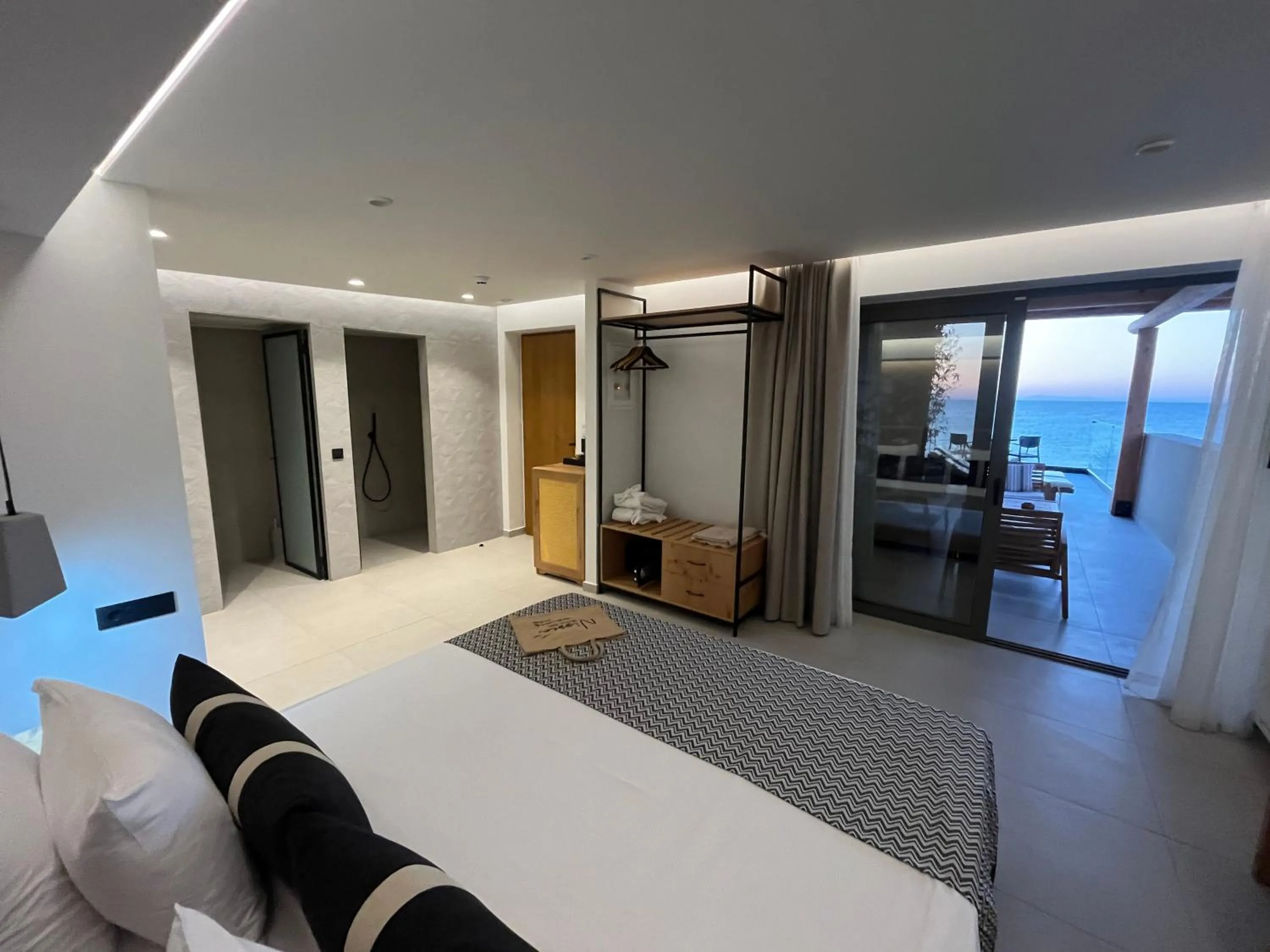 Bed in NISSEA Boutique Hotel