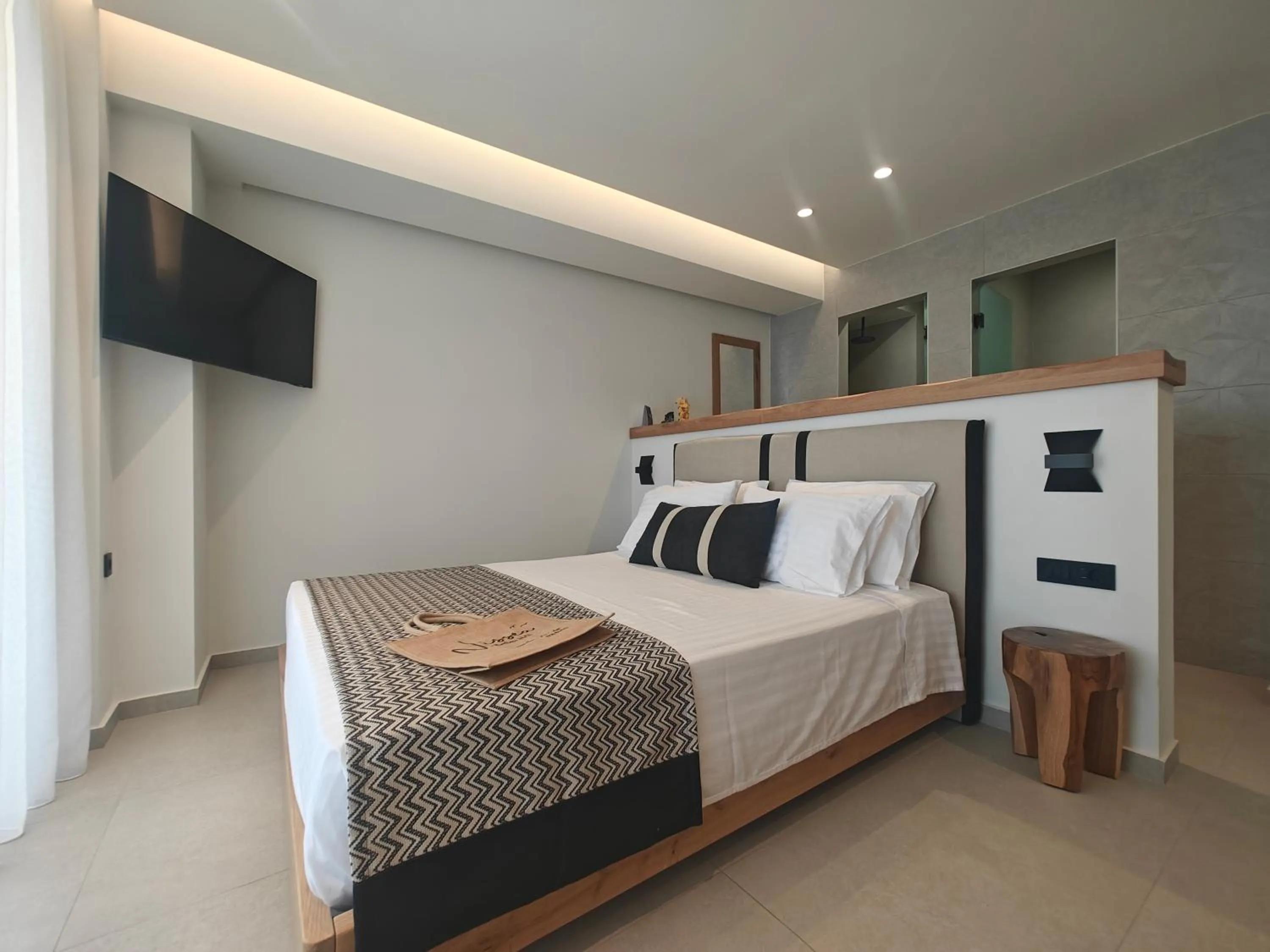 Bed in NISSEA Boutique Hotel