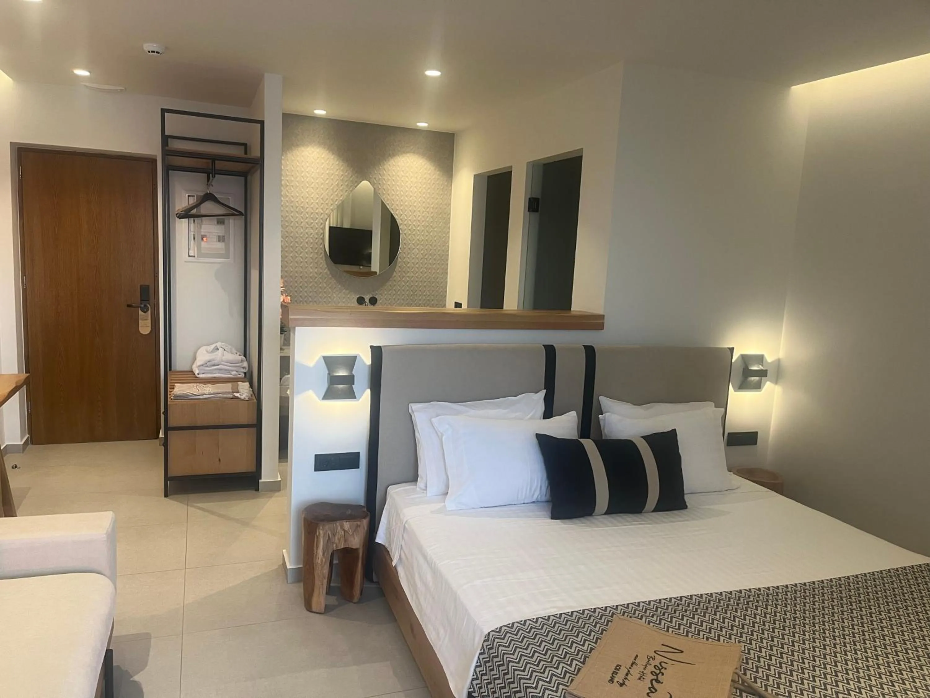Bed in NISSEA Boutique Hotel