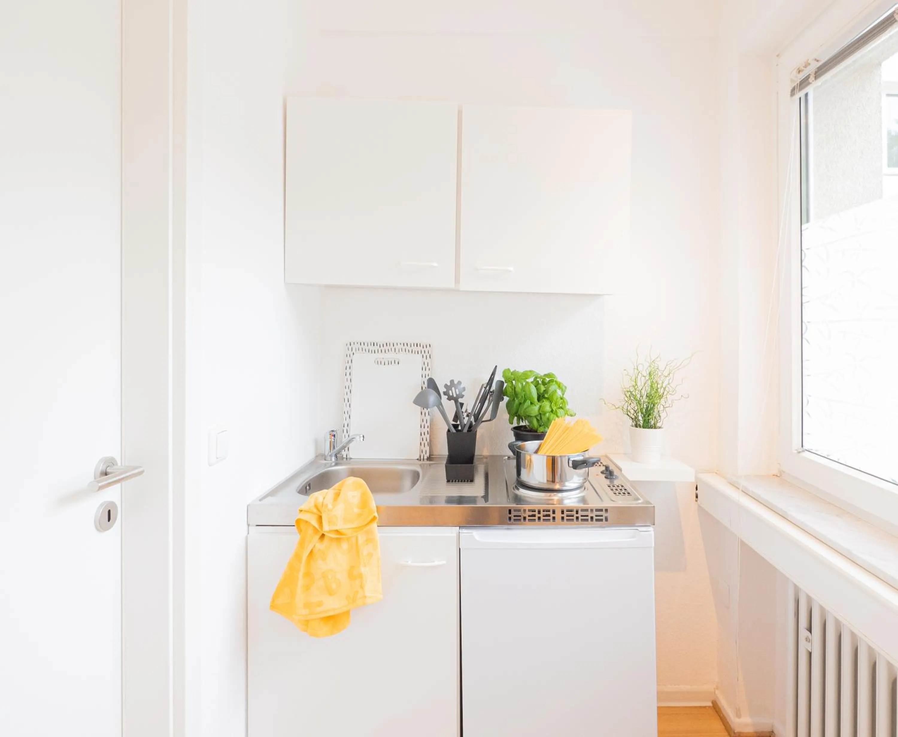 Kitchen or kitchenette in Relax Aachener Boardinghouse Appartements Premium 1