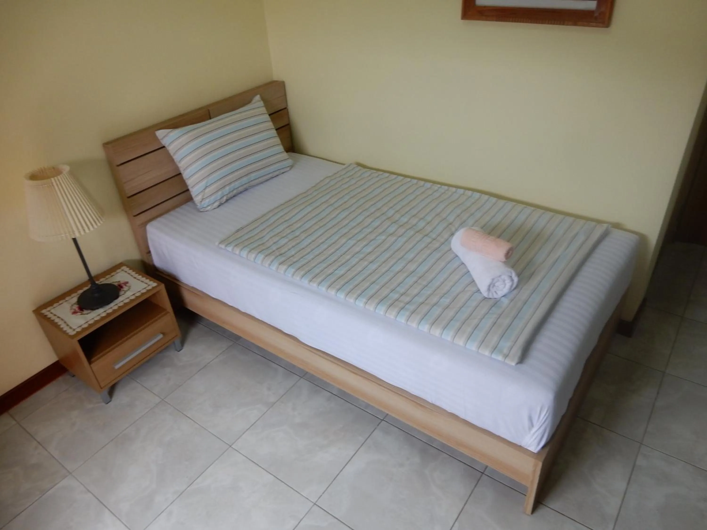 Bed in Malee Resort