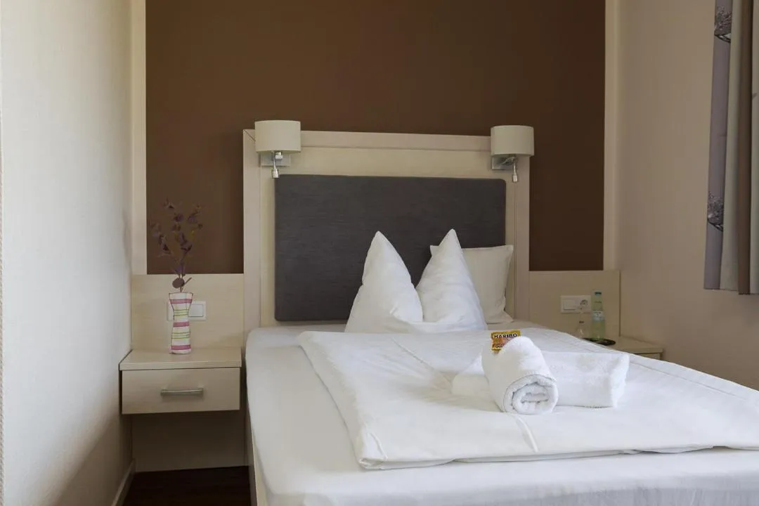 Photo of the whole room, Bed in Landgasthaus Gieseke-Asshorn