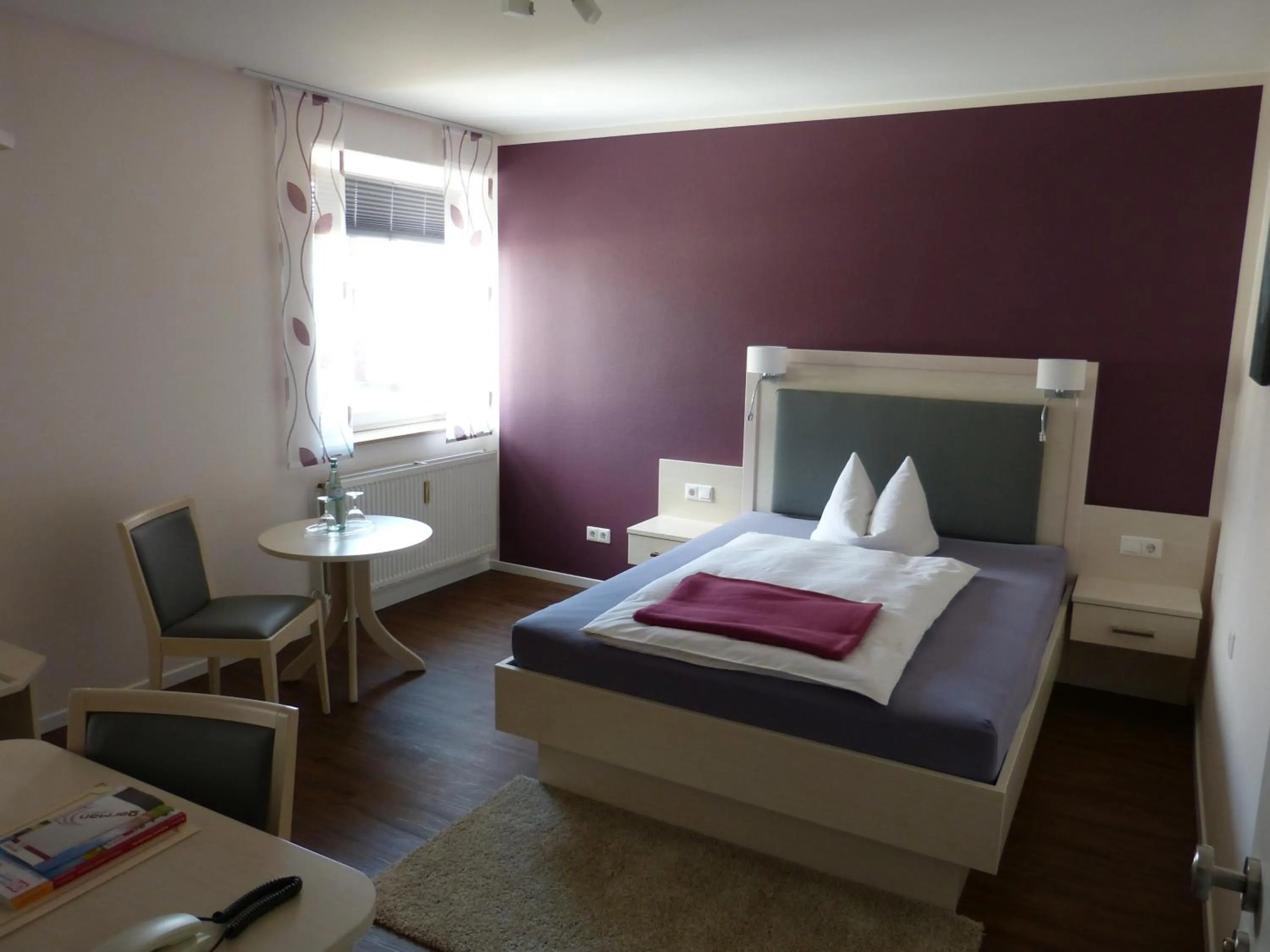 Photo of the whole room, Bed in Landgasthaus Gieseke-Asshorn