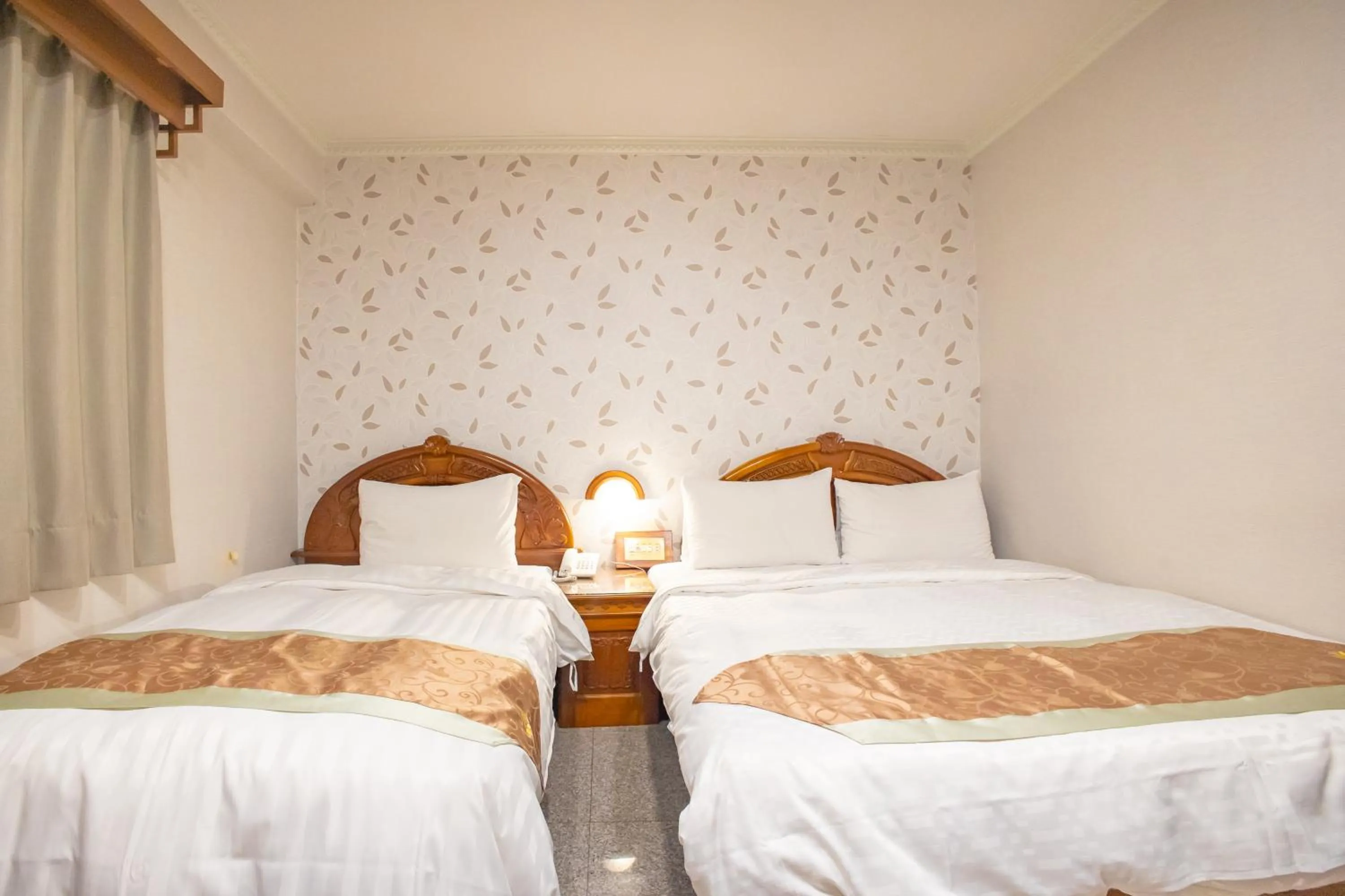 Bed in Mei Jia Mei Hotel