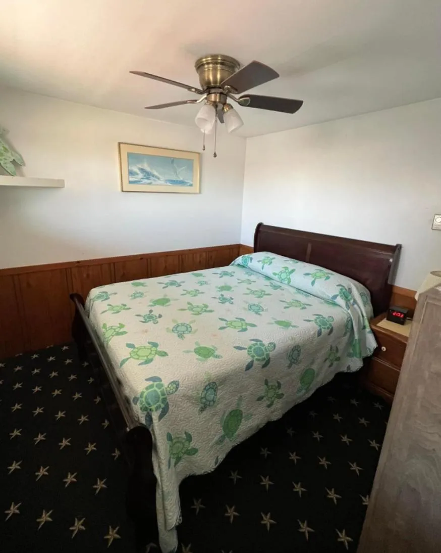 Bed in Moody's Motel and Cottages