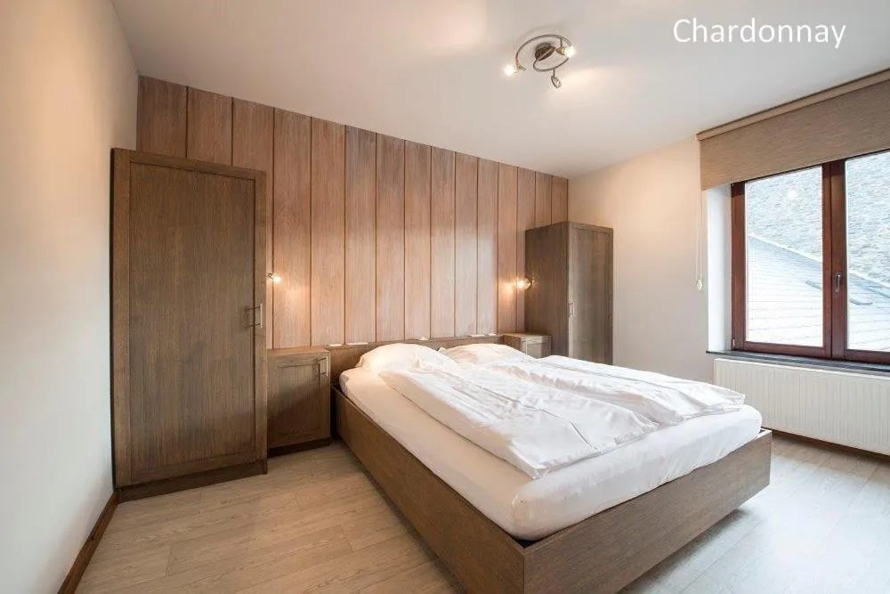 Bedroom, Bed in Appart Hotel Au Pied de Vigne