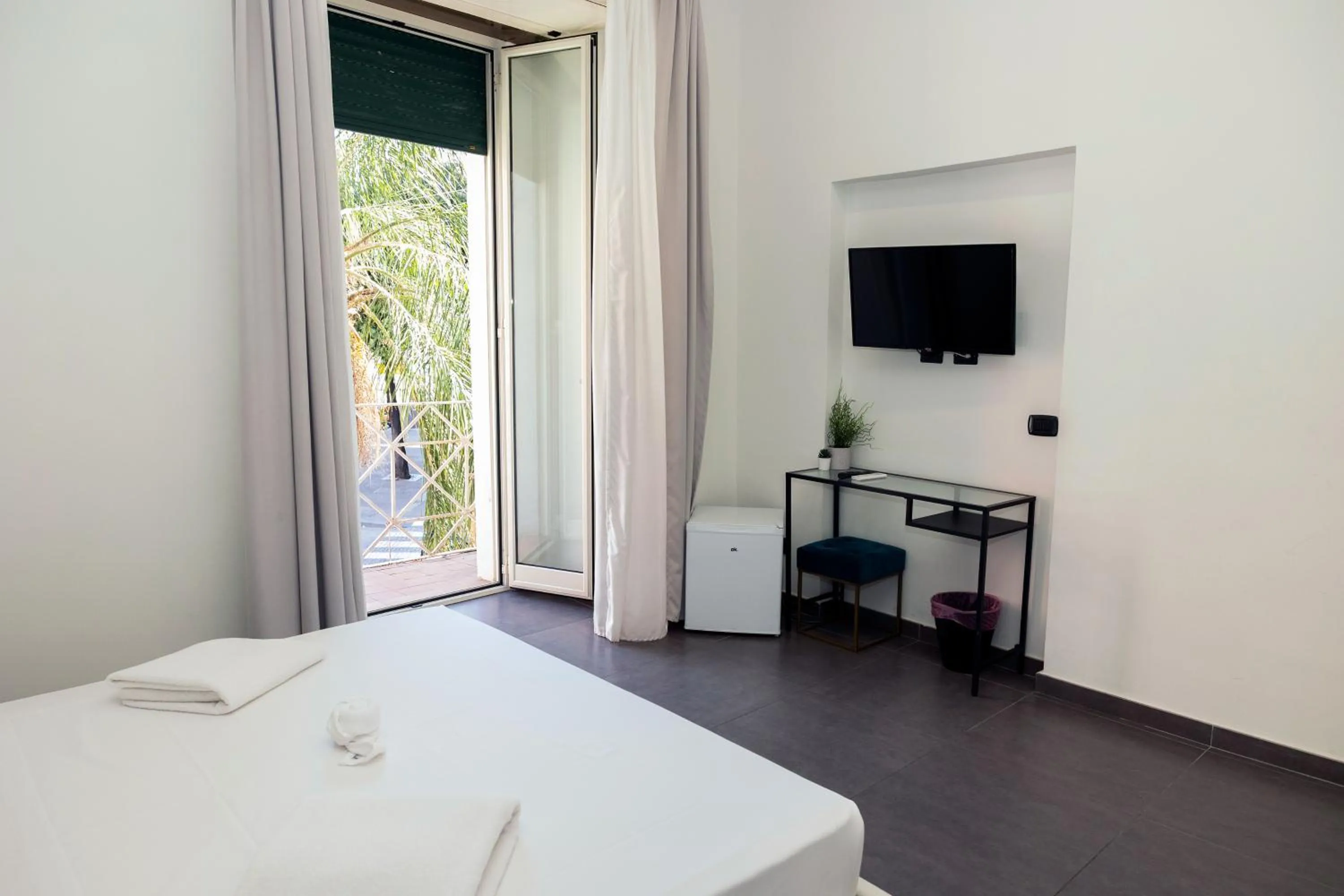 Bed in Doria Suites Napoli