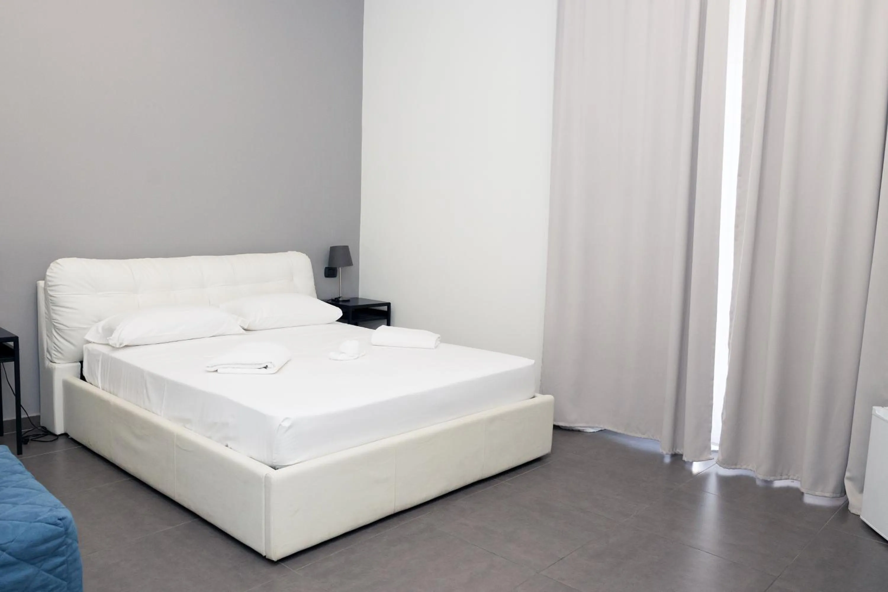 Bed in Doria Suites Napoli