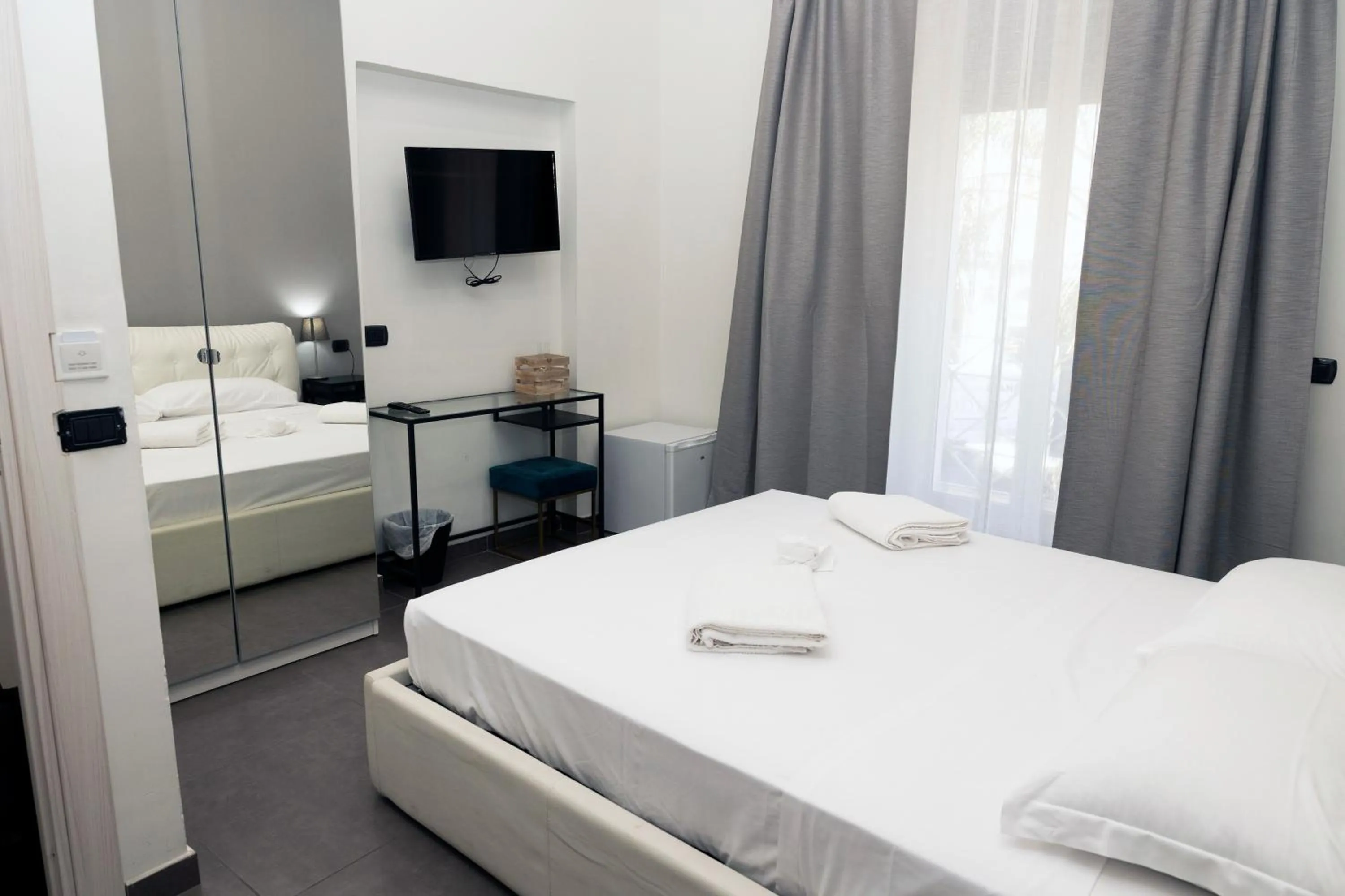 Bed in Doria Suites Napoli