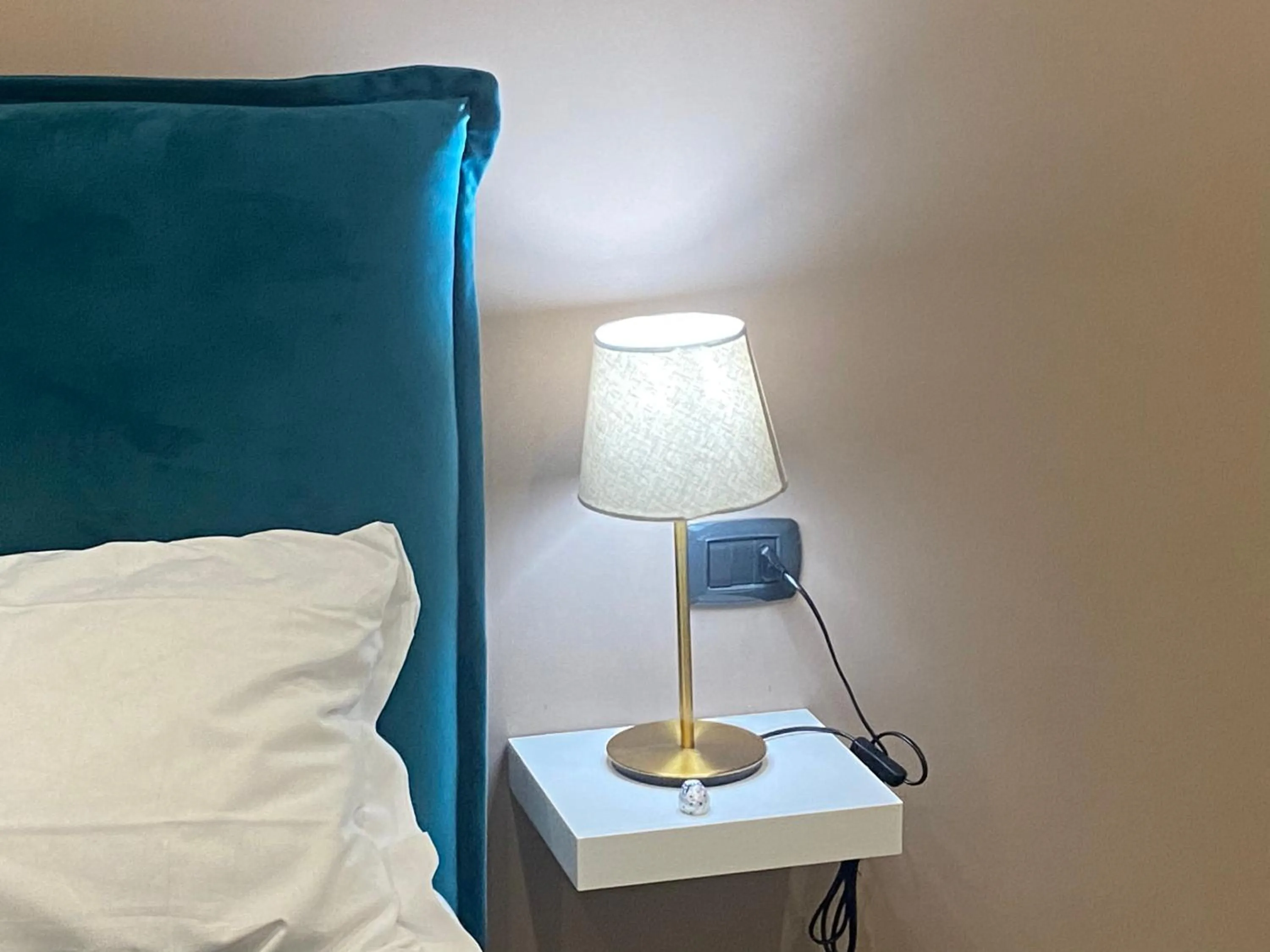 Bed in Doria Suites Napoli