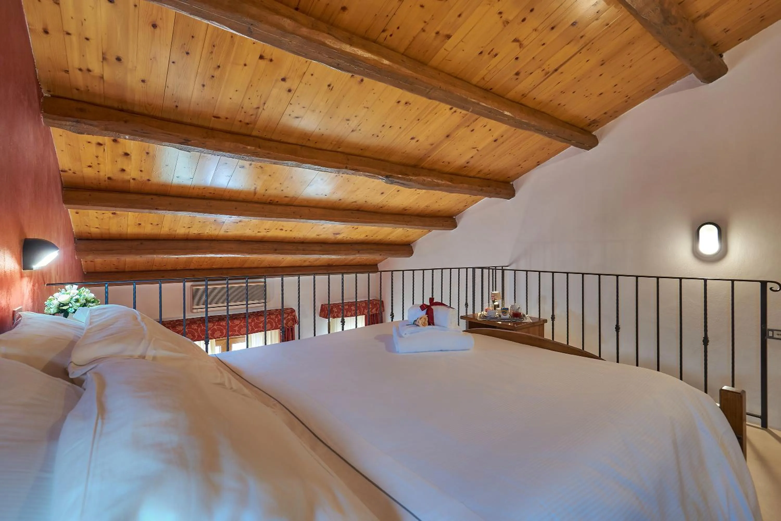 Bed in Casanova - Panoramic Rooms and Suites