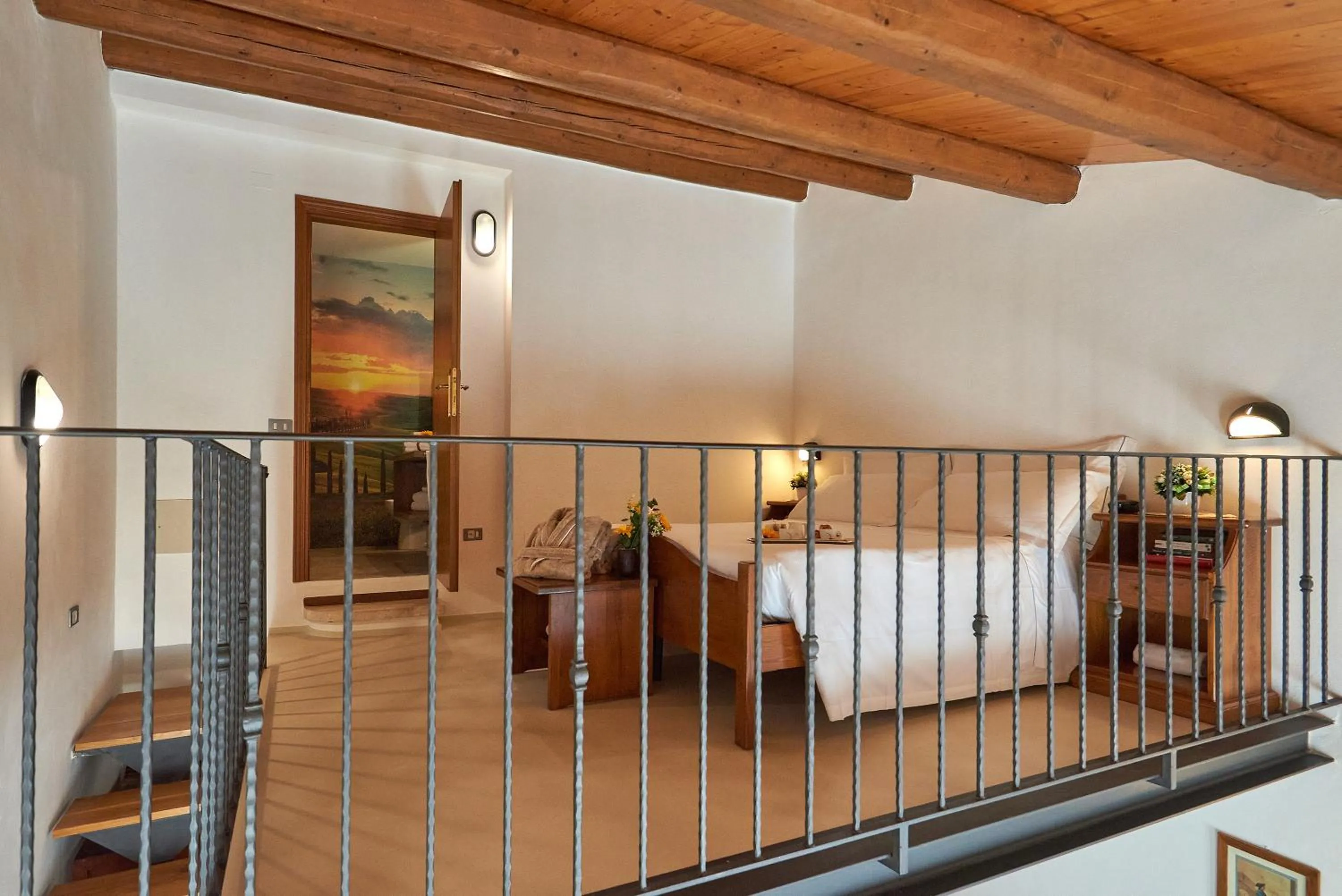 Bed in Casanova - Panoramic Rooms and Suites