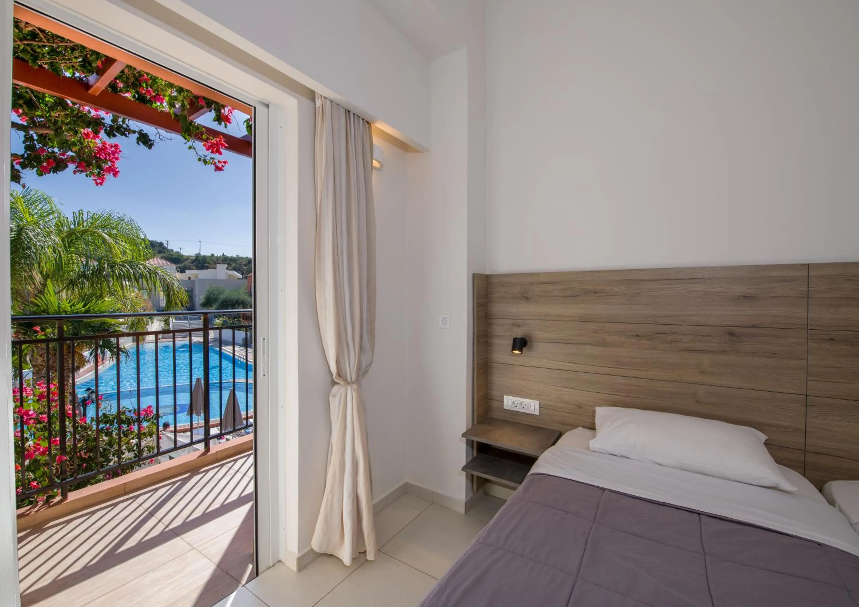 Bed in Stefan Village Hotel