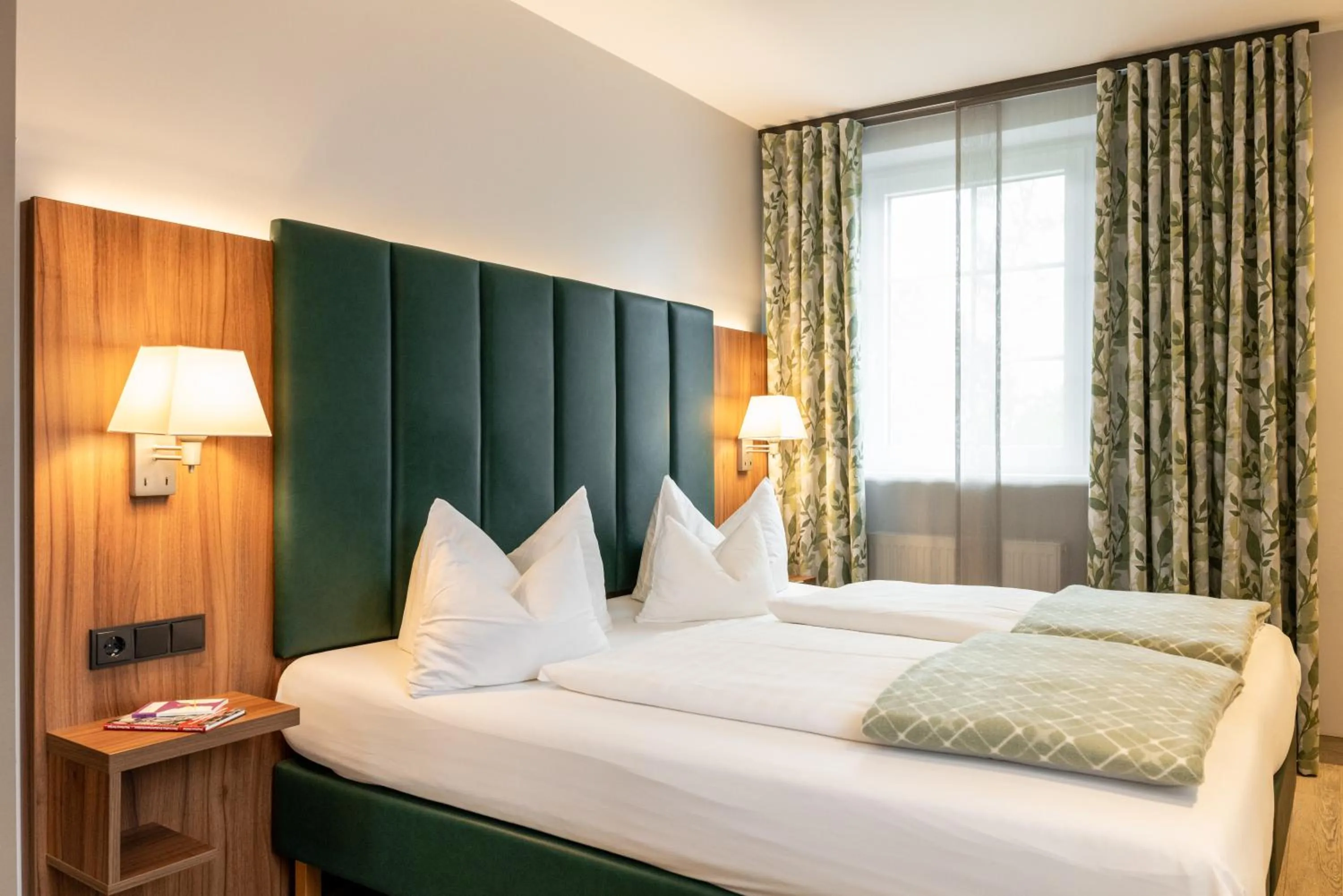 Bed in Hotel Goldener Hirsch