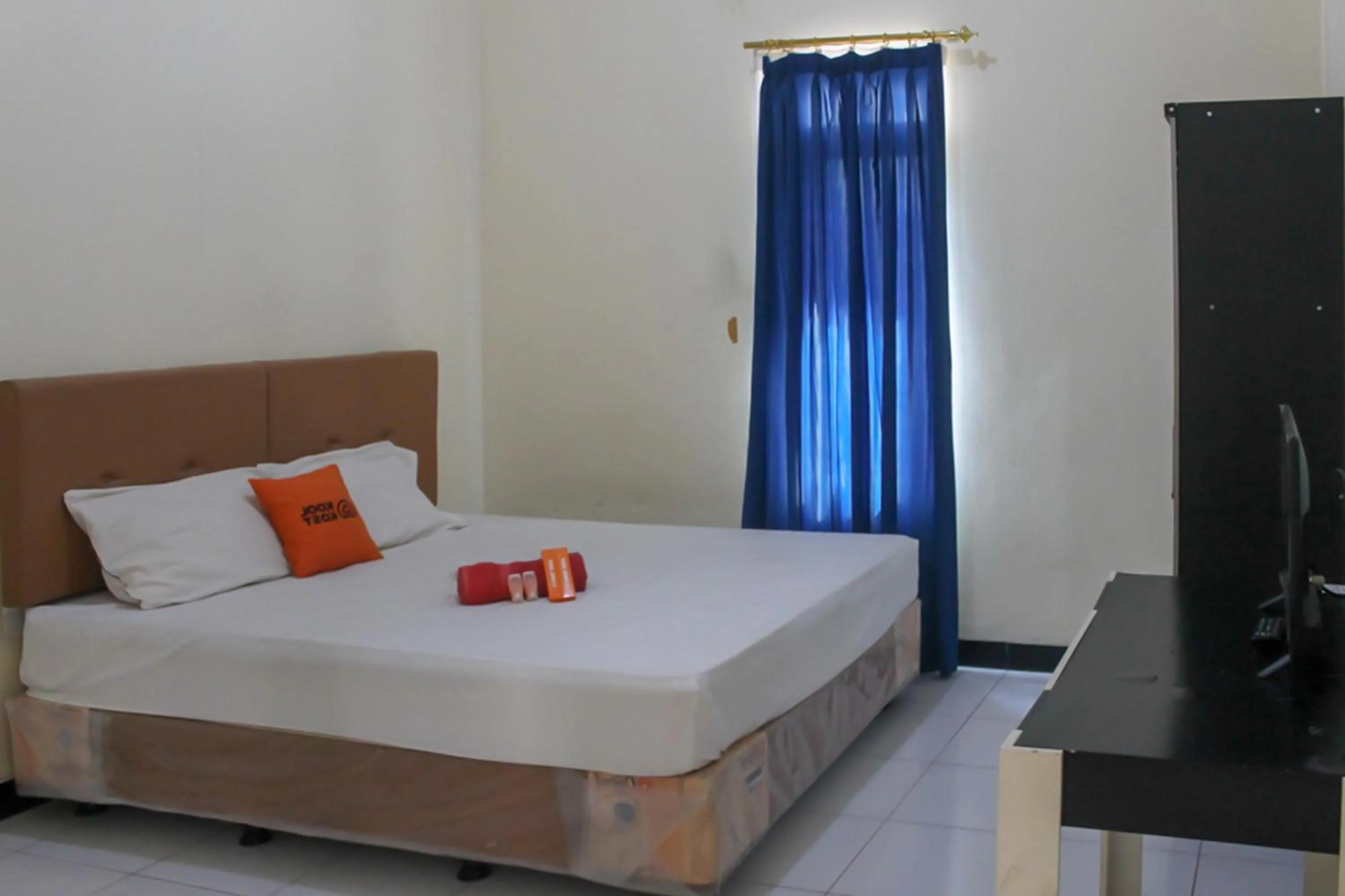 Bed in KoolKost Syariah near Universitas Ahmad Dahlan Kampus 1