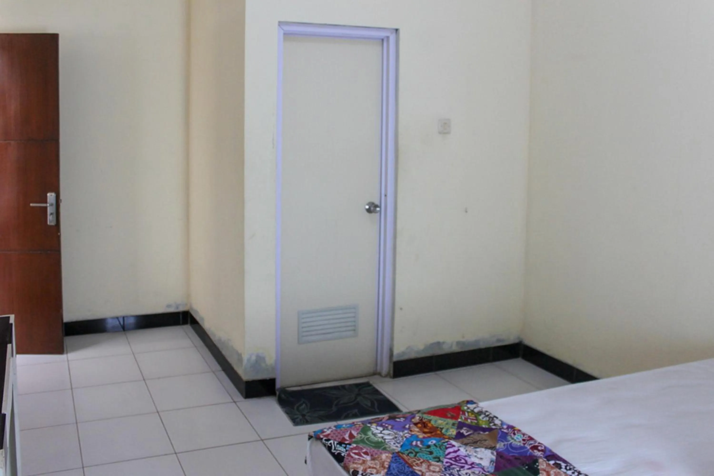 Bed in KoolKost Syariah near Universitas Ahmad Dahlan Kampus 1