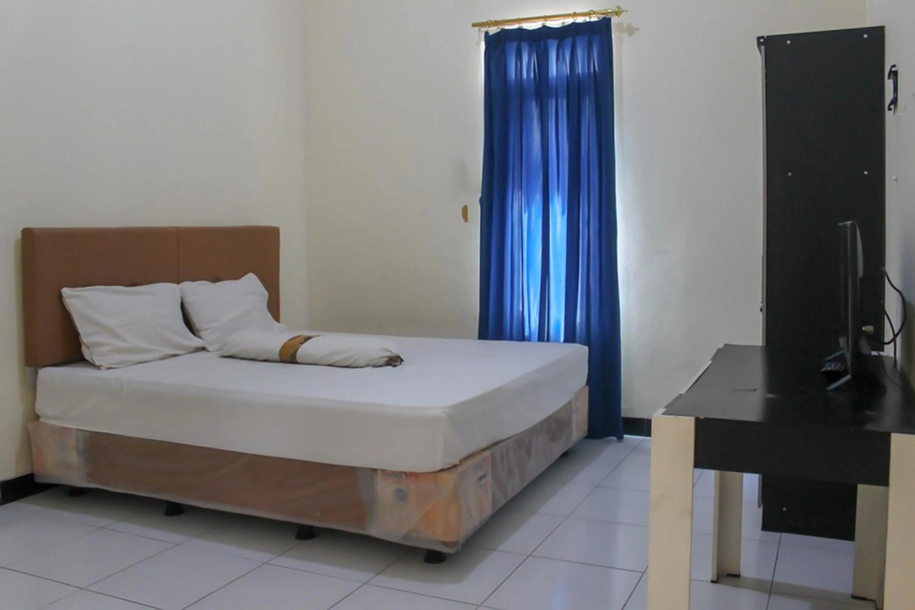 Bed in KoolKost Syariah near Universitas Ahmad Dahlan Kampus 1