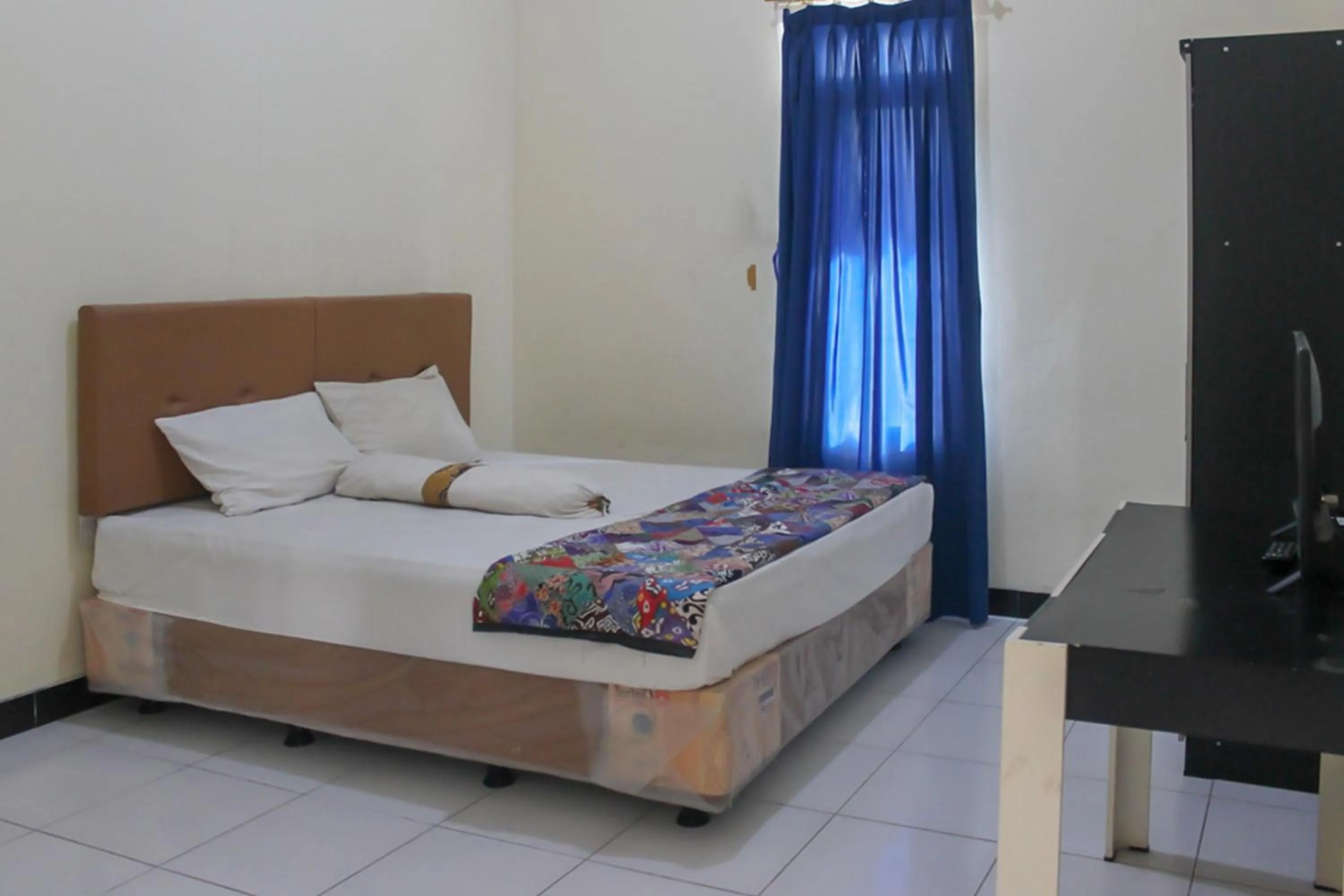 Bed in KoolKost Syariah near Universitas Ahmad Dahlan Kampus 1