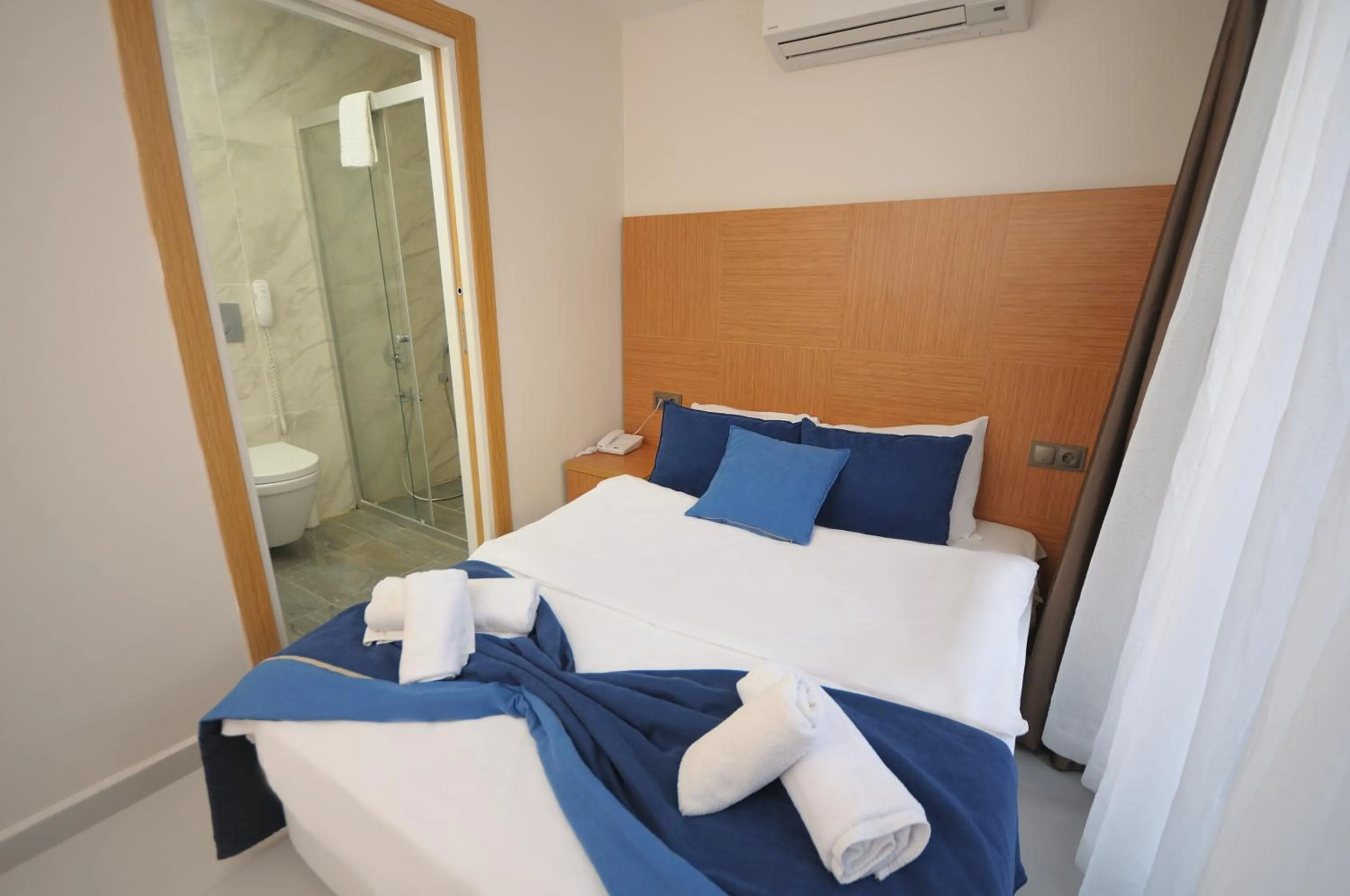 Bed in Saatlı Hotel