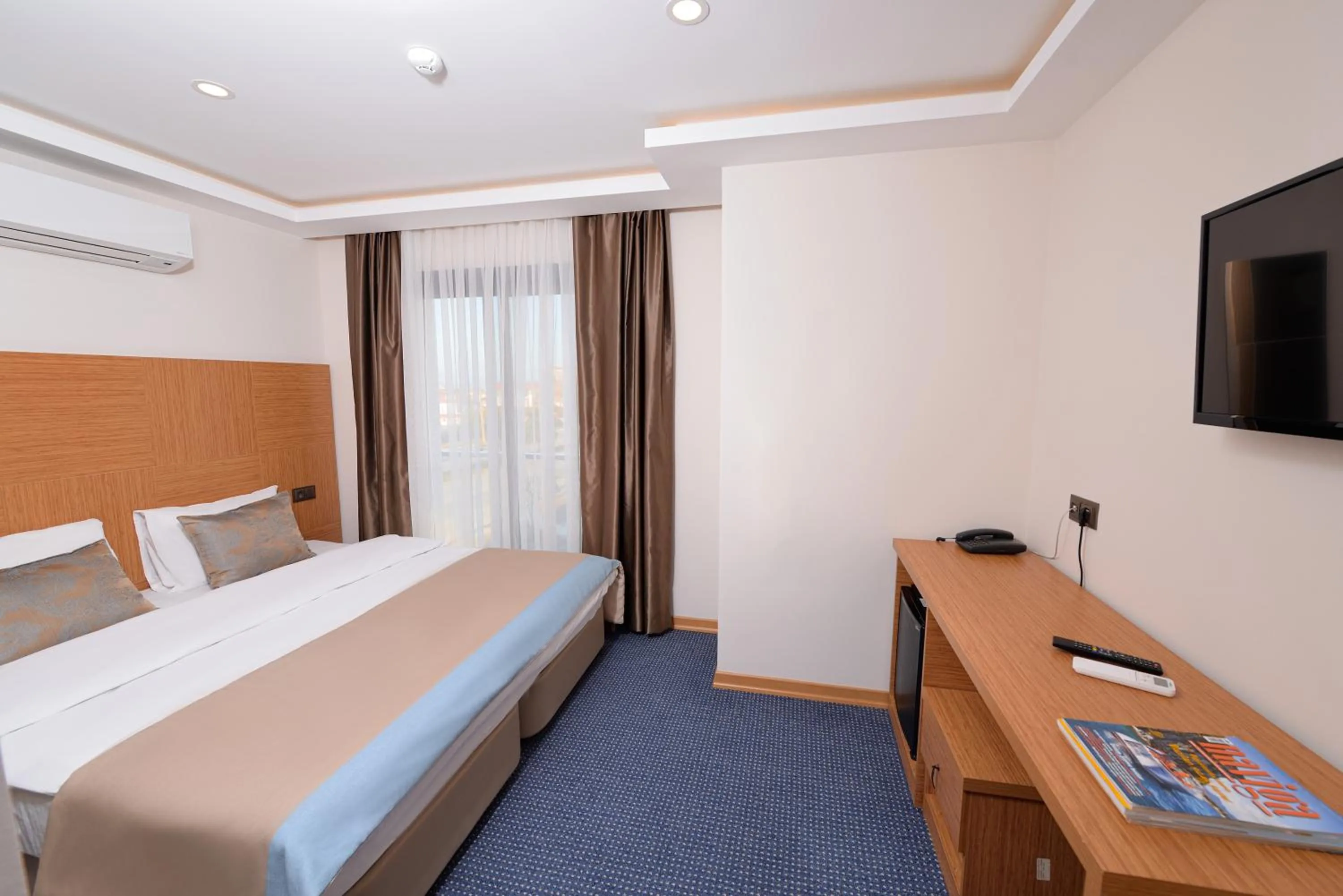 Bed in Saatlı Hotel