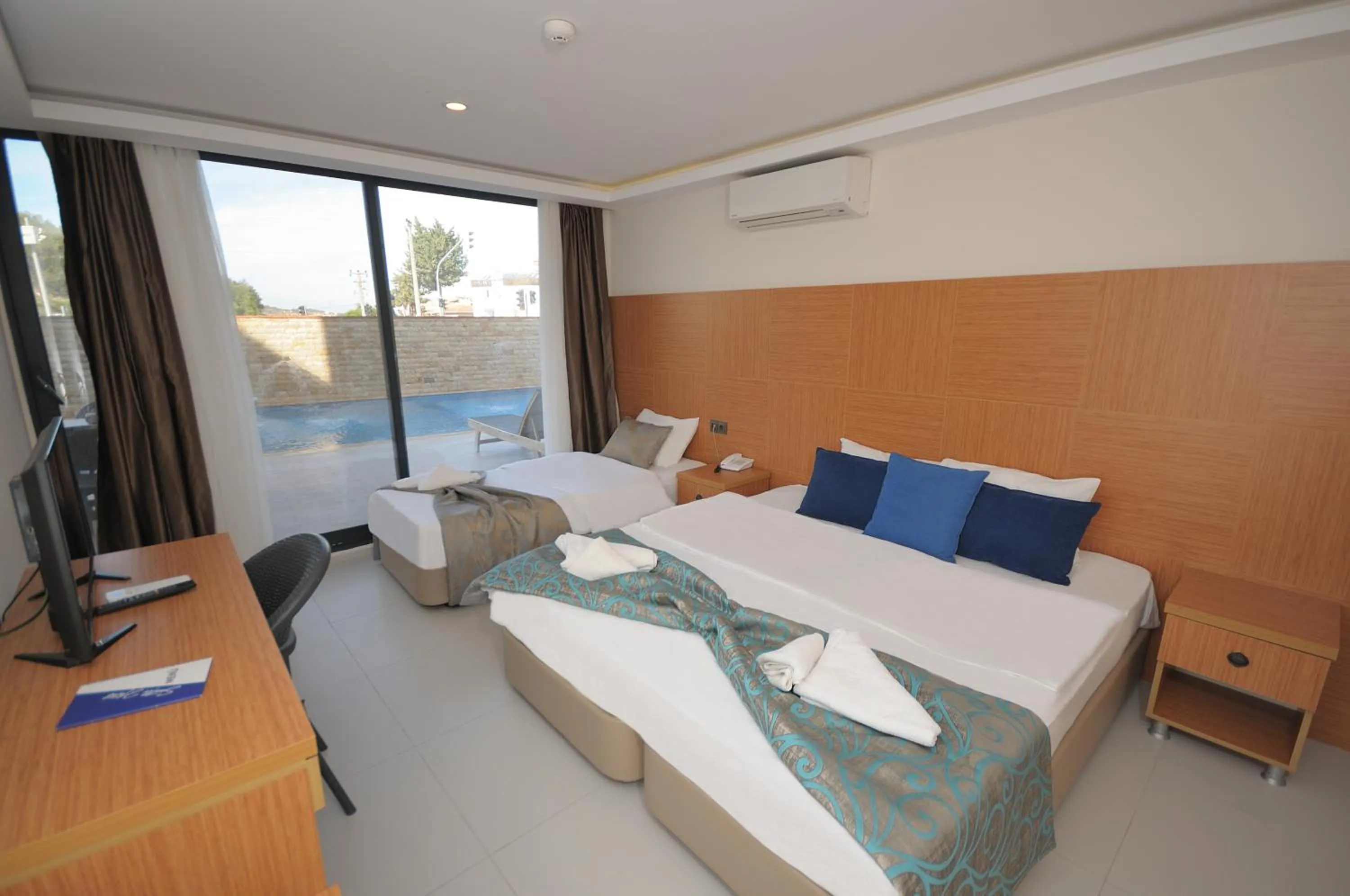 Bed in Saatlı Hotel