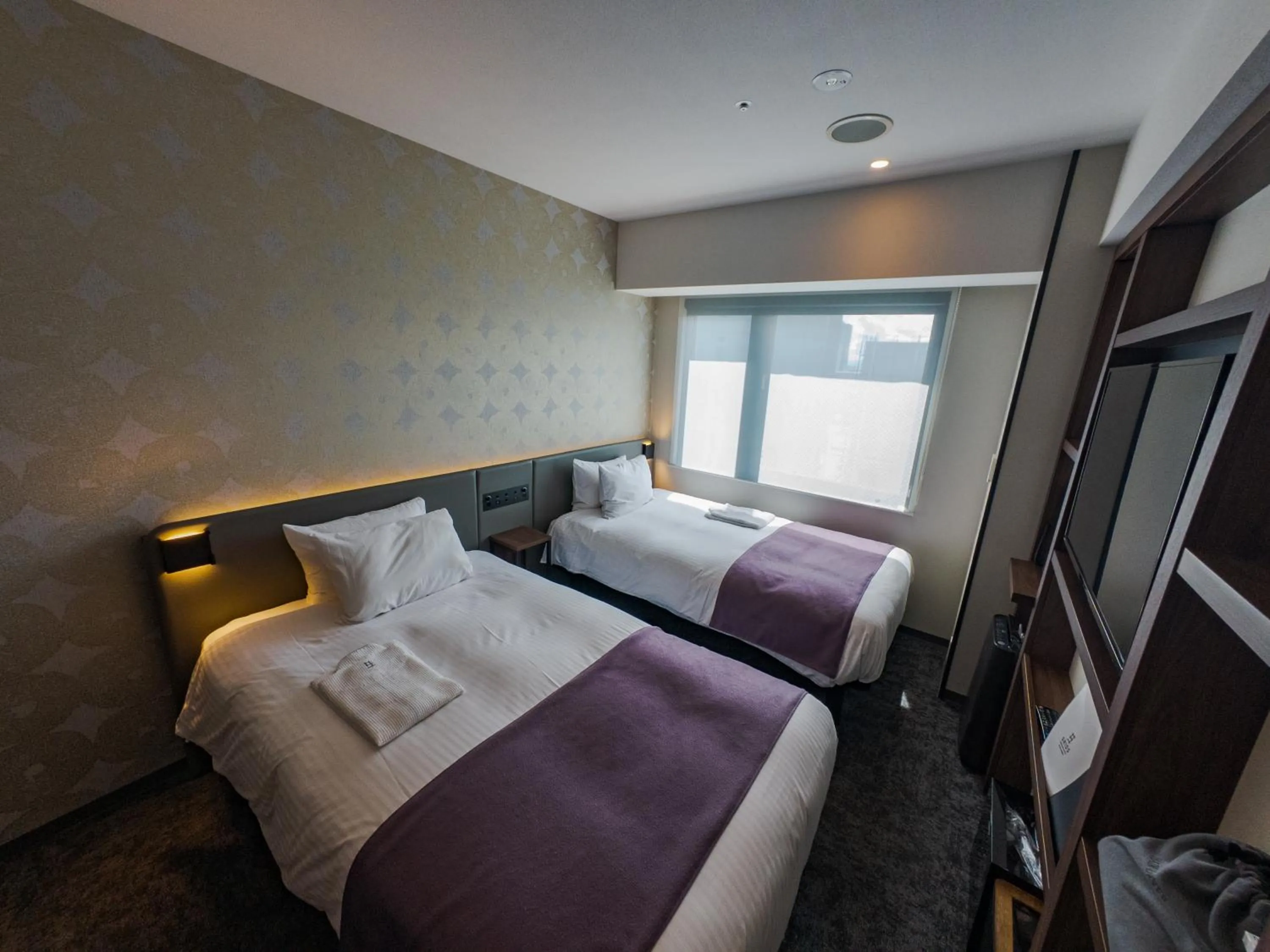 Bed in GRIDS PREMIUM HOTEL OSAKA NAMBA