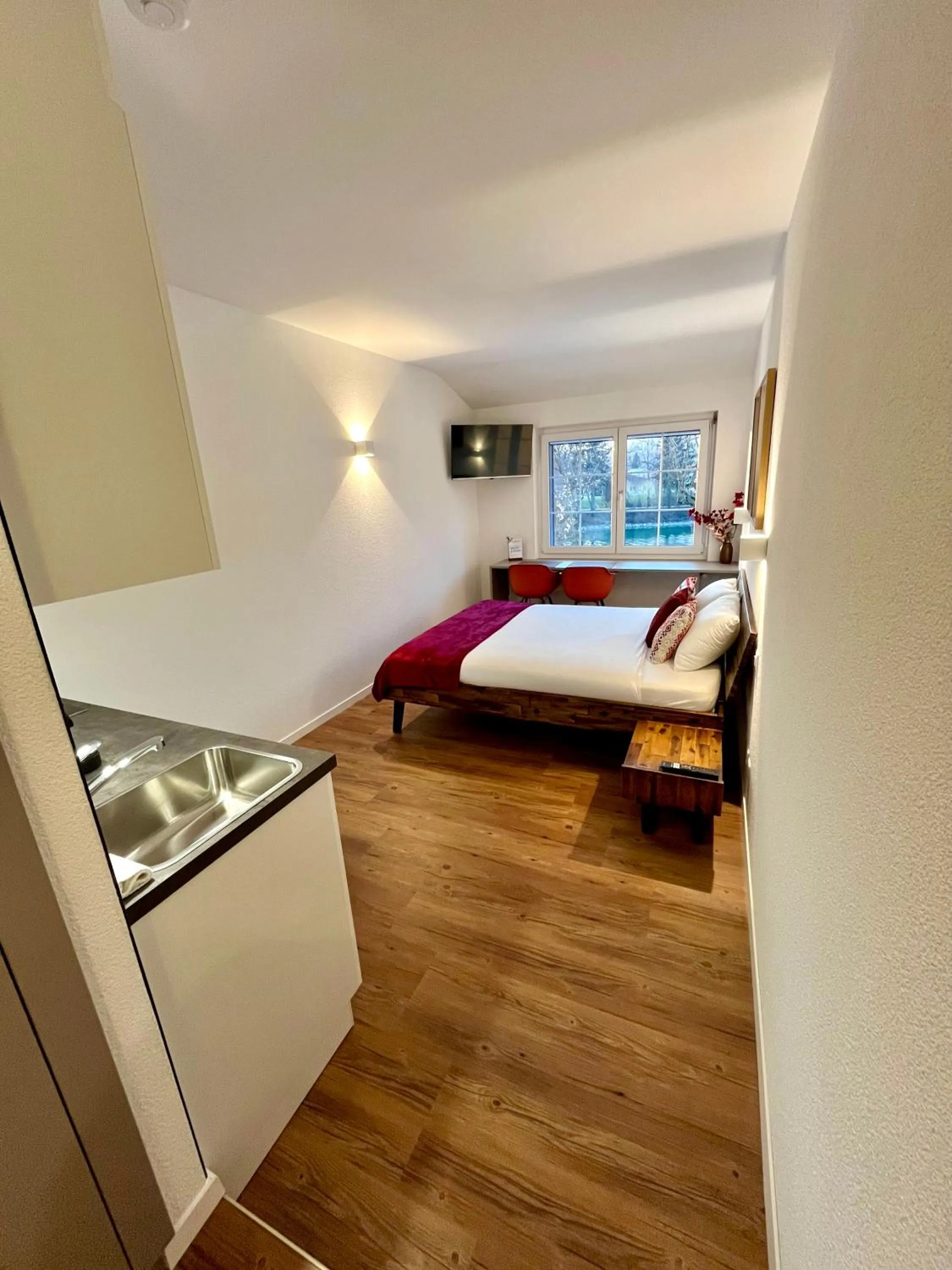 View (from property/room), Bed in Apart-Hôtel Pont-de-Thielle