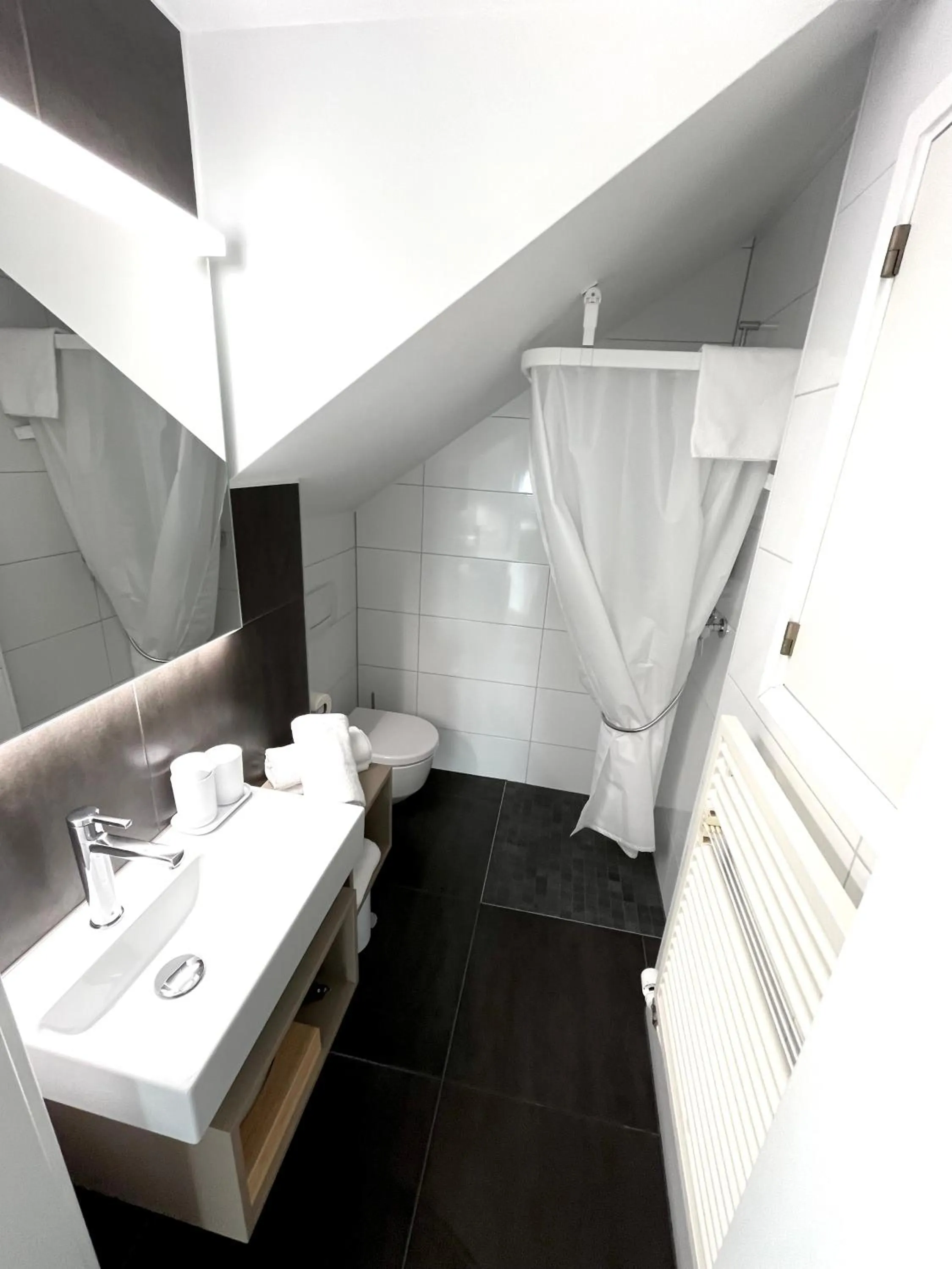Bathroom in Apart-Hôtel Pont-de-Thielle