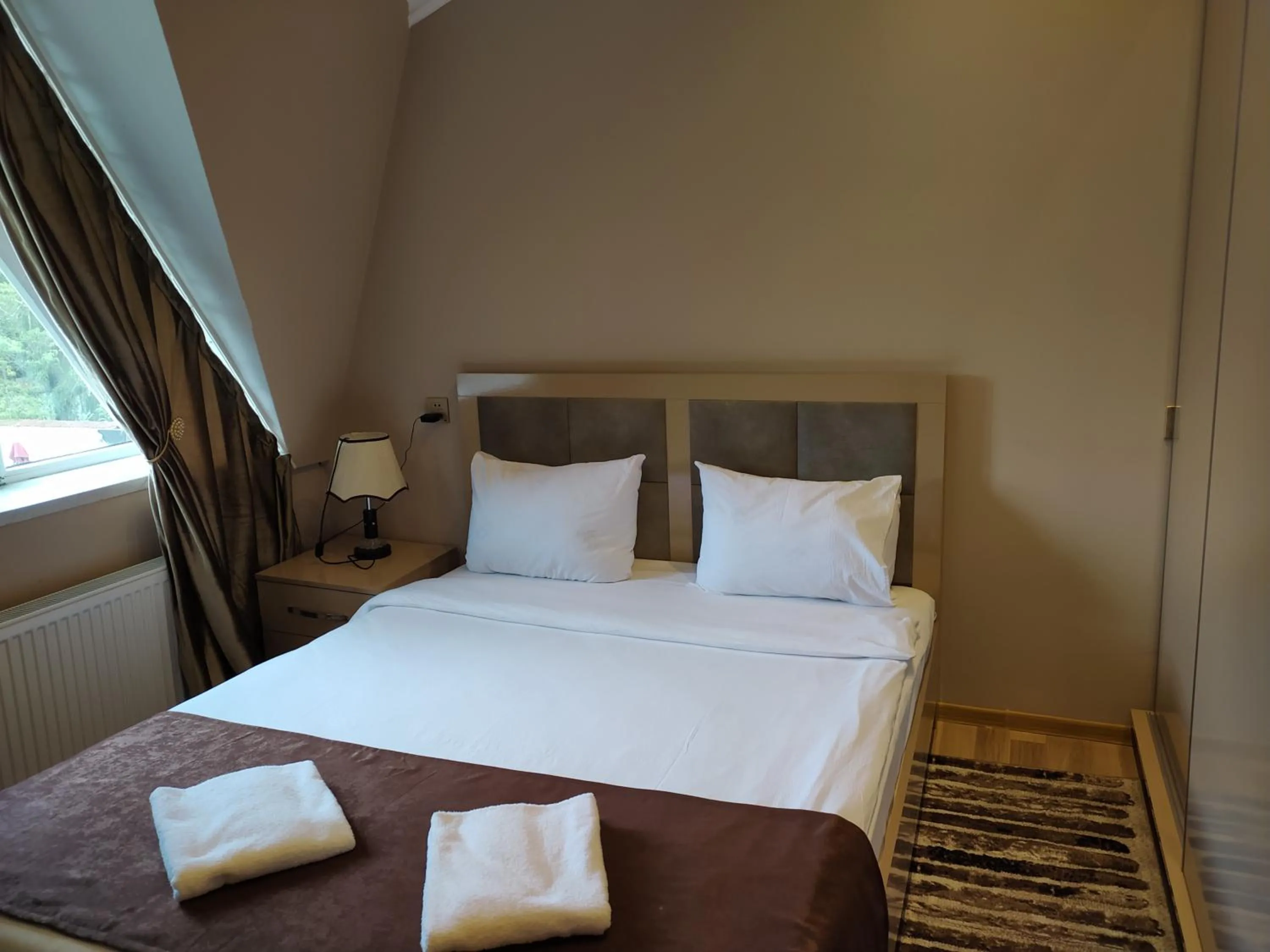 Bed in Gold Hotel Quba