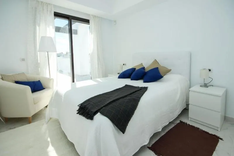 Bed in Casares Del Mar Luxury Apartments penthouse with beach access