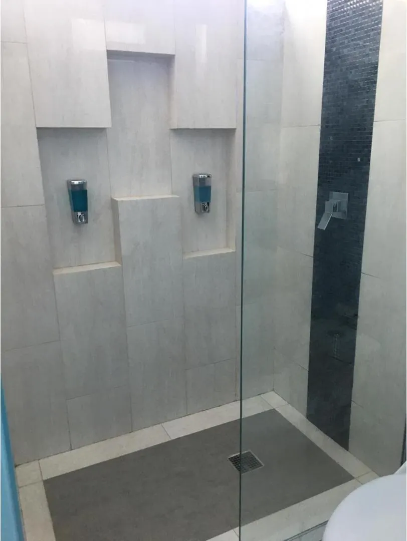 Palmarena Rooms & Residences - Long Stay Comfort with Parking, Sauna, Gym & Pool - Steps from 5th Avenue