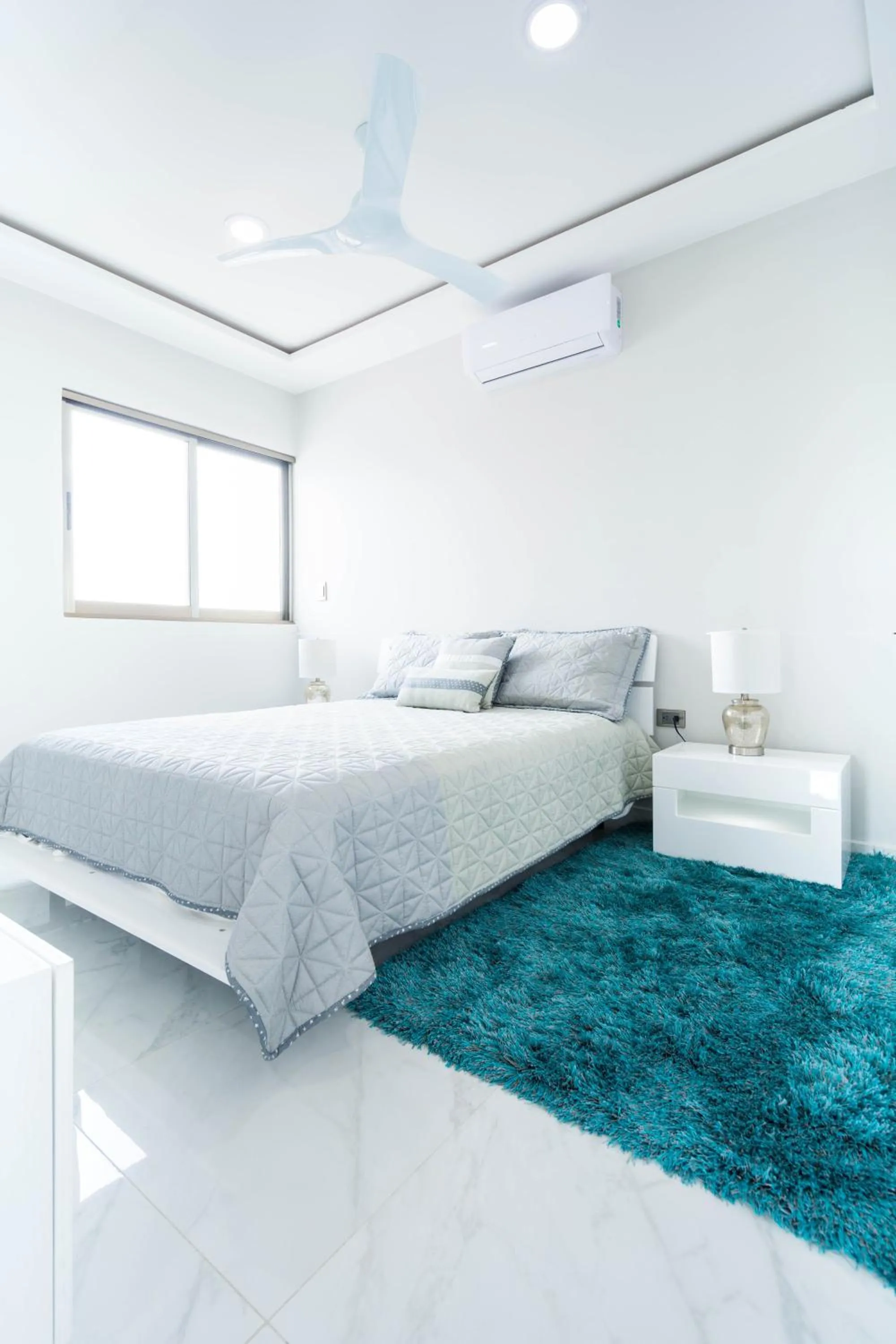 Bed in Palmarena Rooms & Residences - Long Stay Comfort with Parking, Sauna, Gym & Pool - Steps from 5th Avenue