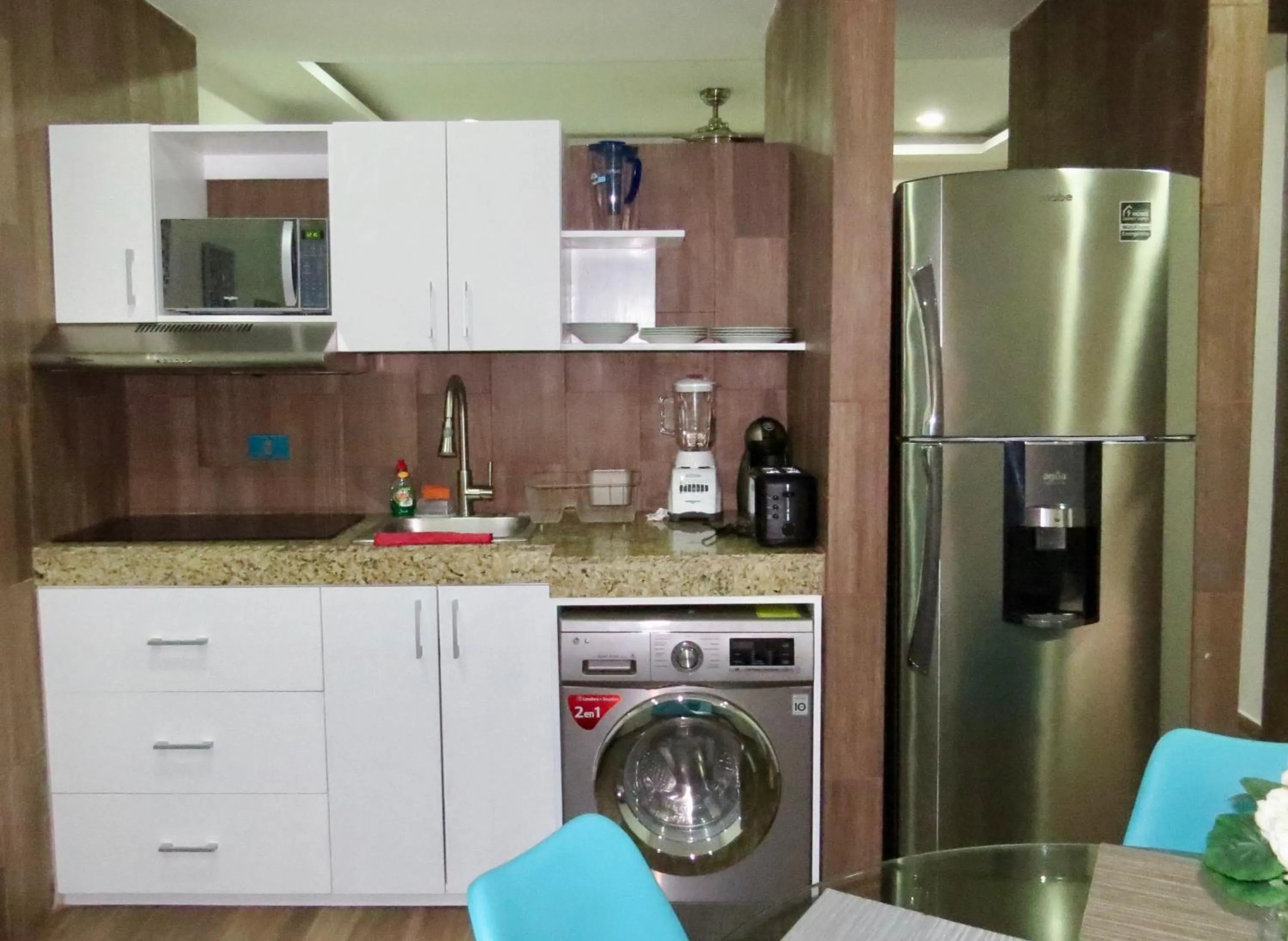 Kitchen or kitchenette in PALMARENA by Nah Hotels