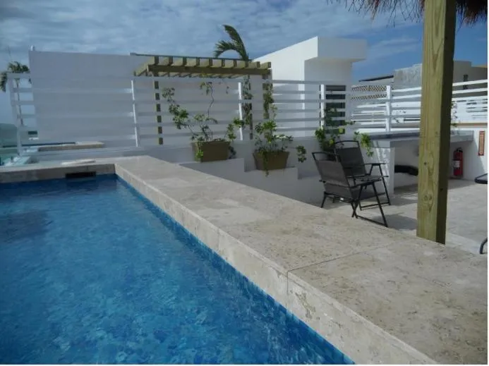 Palmarena Rooms & Residences - Long Stay Comfort with Parking, Sauna, Gym & Pool - Steps from 5th Avenue