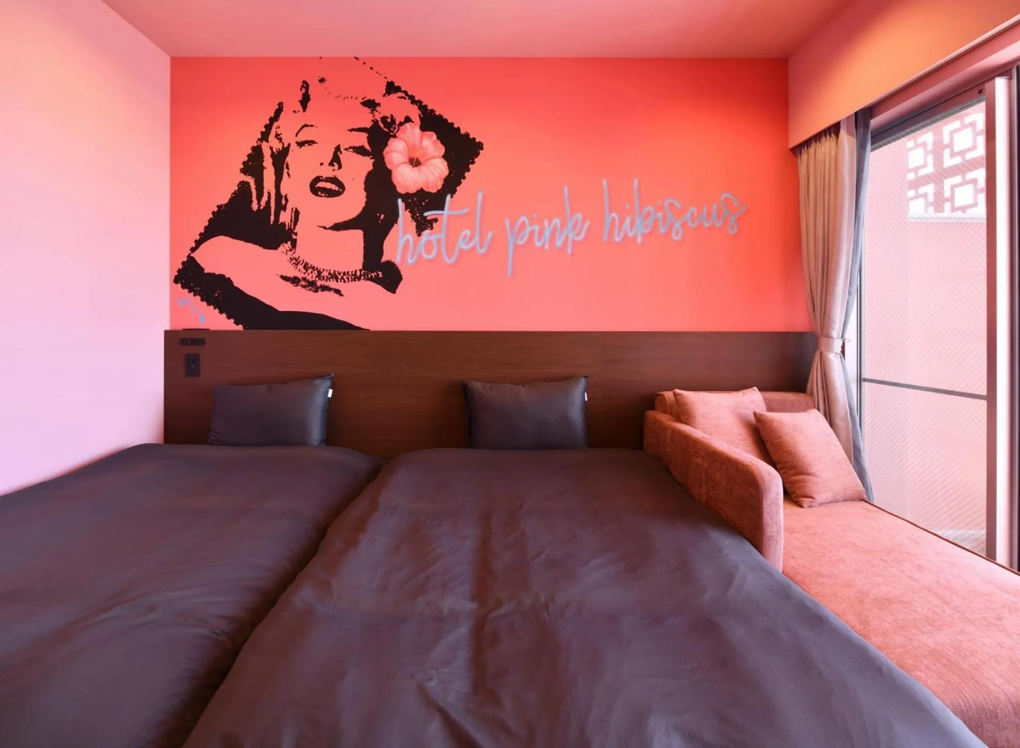 Bed in HOTEL PINK HIBISCUS